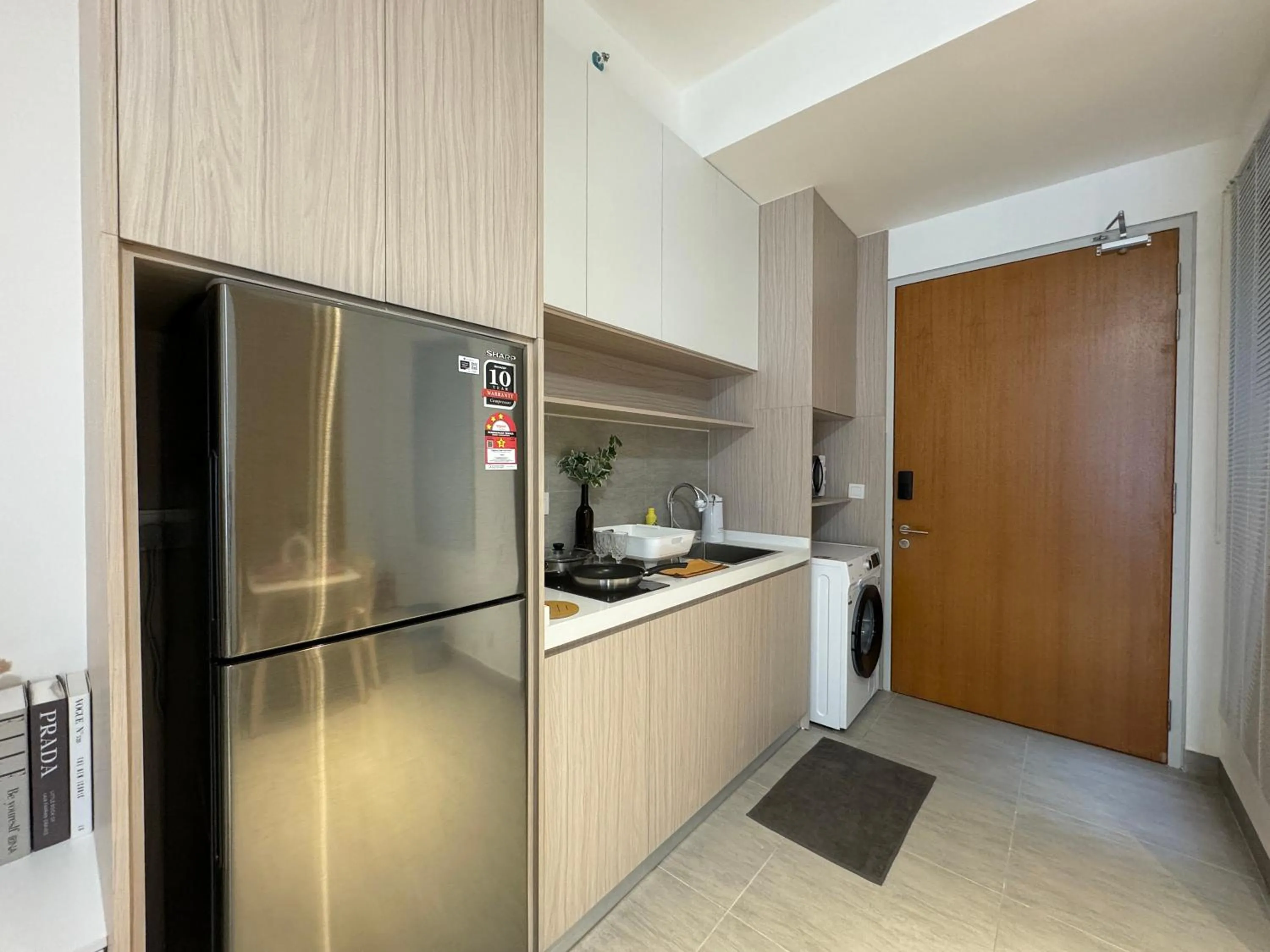 Kitchen or kitchenette in Sunsuria Forum SOHO & Residence Suites Setia Alam by MOKA