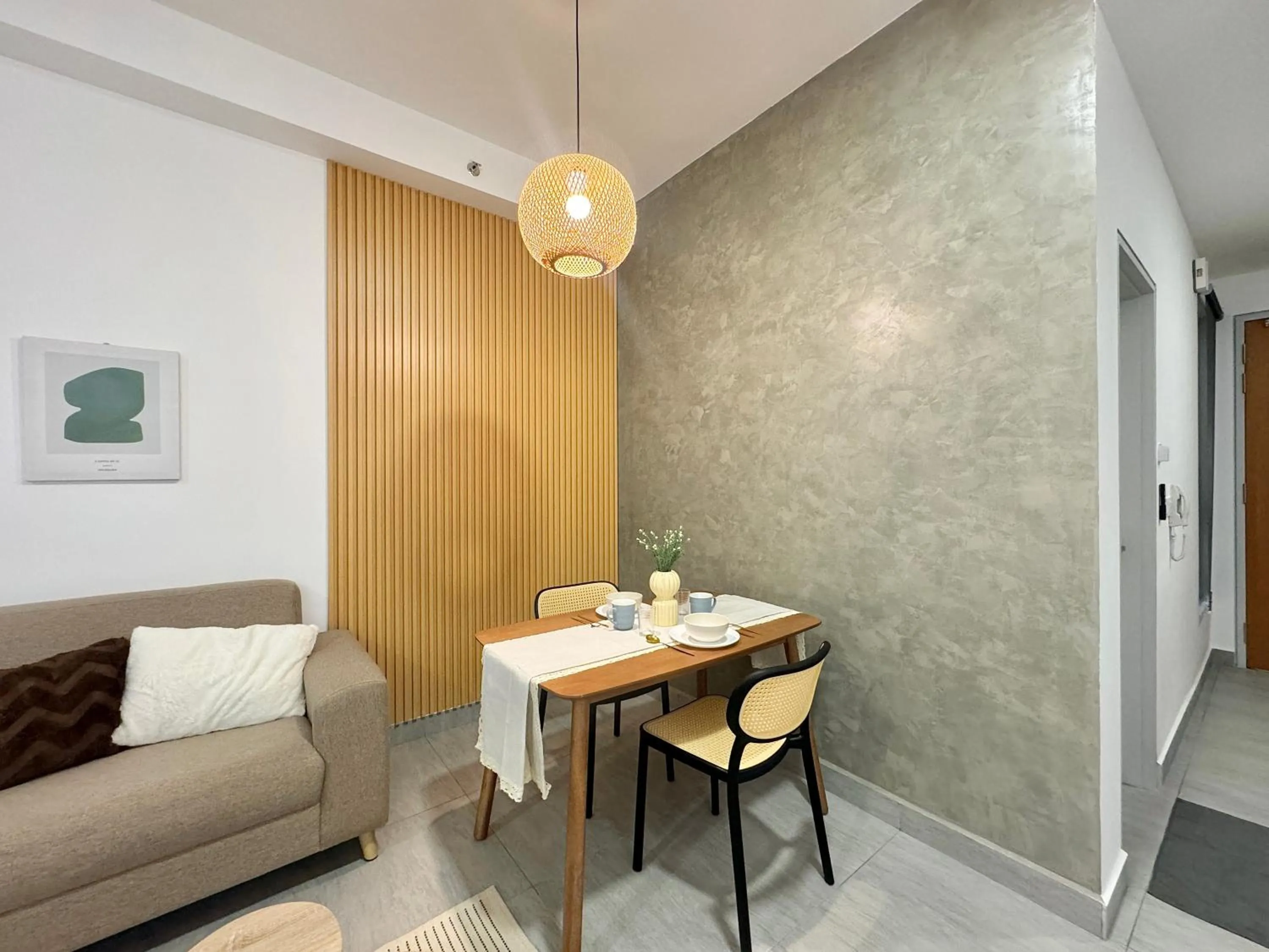 Living room in Sunsuria Forum SOHO & Residence Suites Setia Alam by MOKA