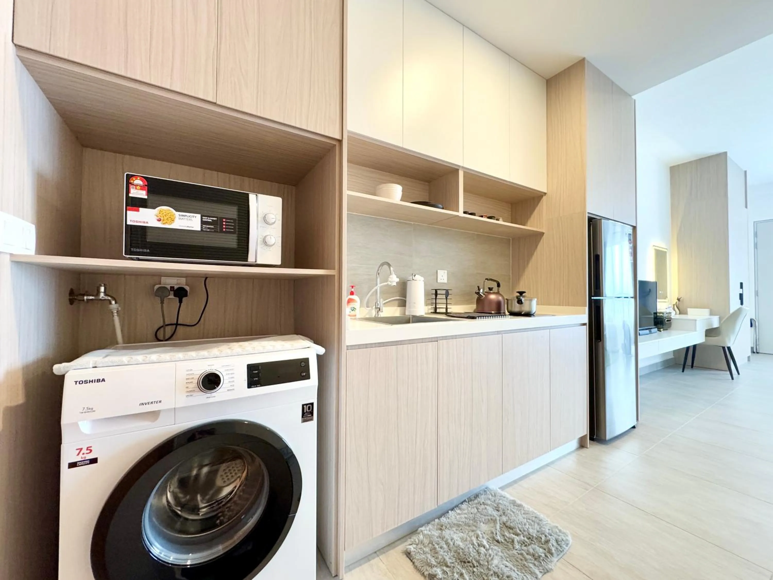 Kitchen or kitchenette in Sunsuria Forum SOHO & Residence Suites Setia Alam by MOKA