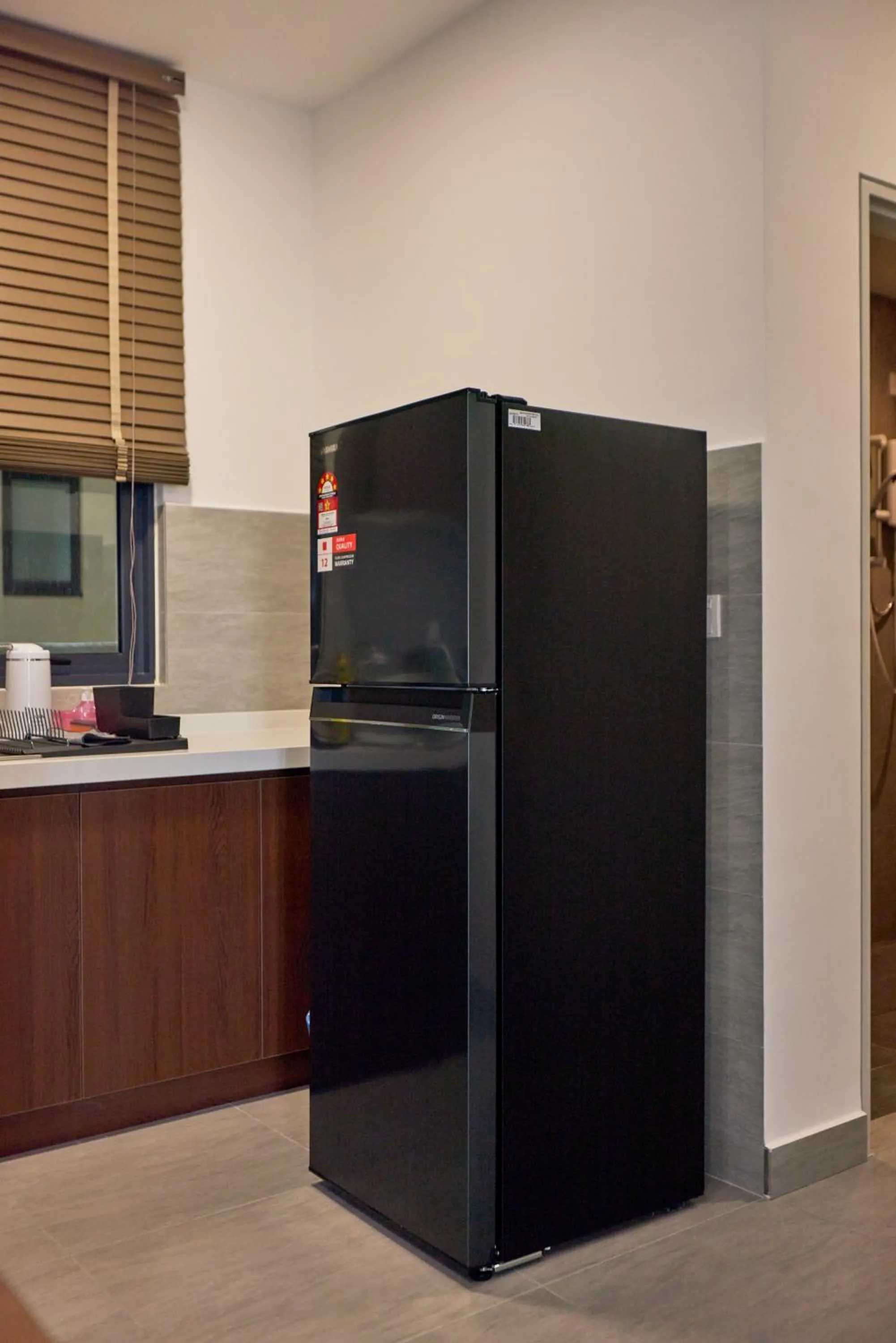 Kitchen or kitchenette in Sunsuria Forum SOHO & Residence Suites Setia Alam by MOKA