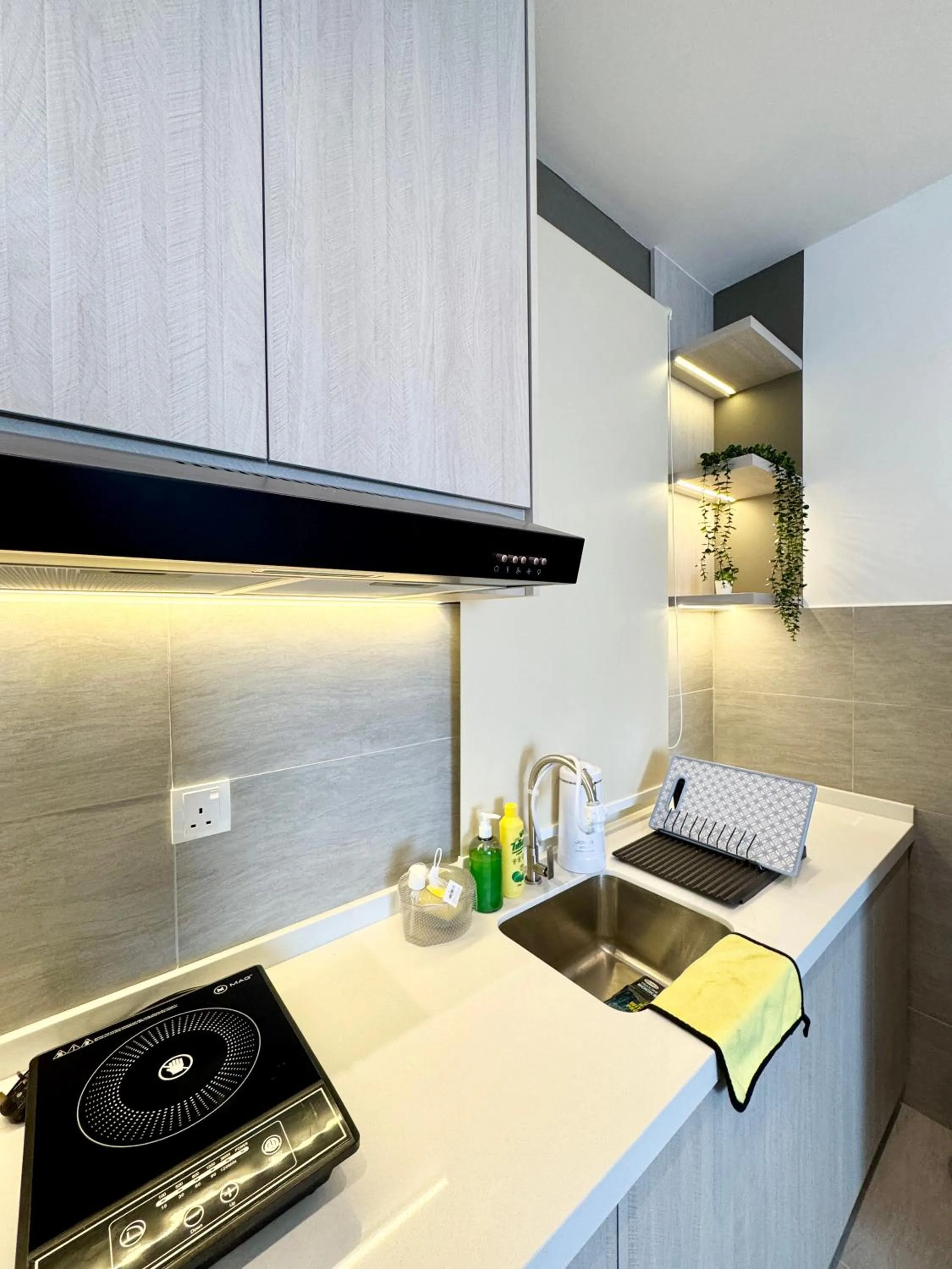 Kitchen or kitchenette in Sunsuria Forum SOHO & Residence Suites Setia Alam by MOKA