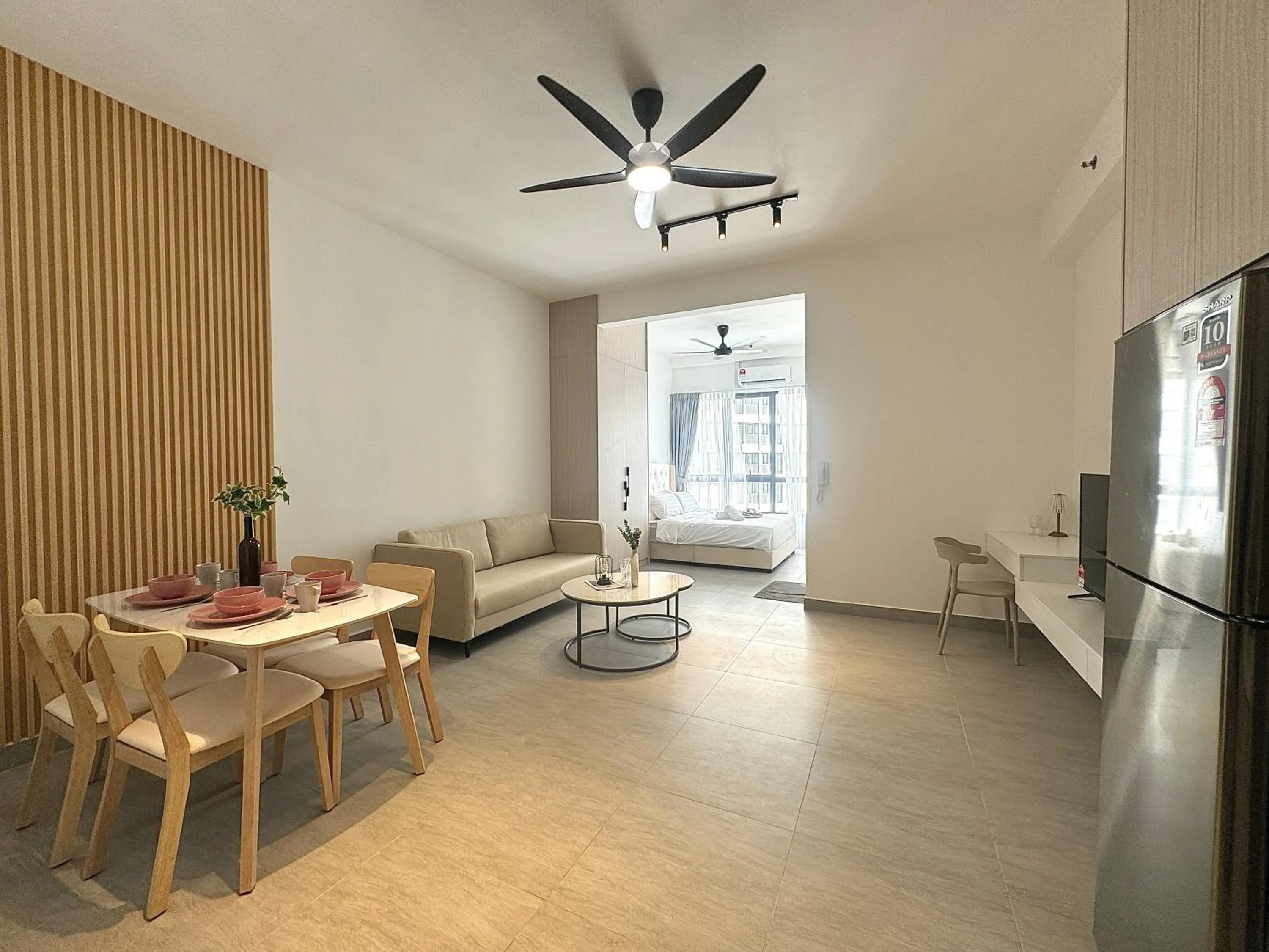 Living room in Sunsuria Forum SOHO & Residence Suites Setia Alam by MOKA