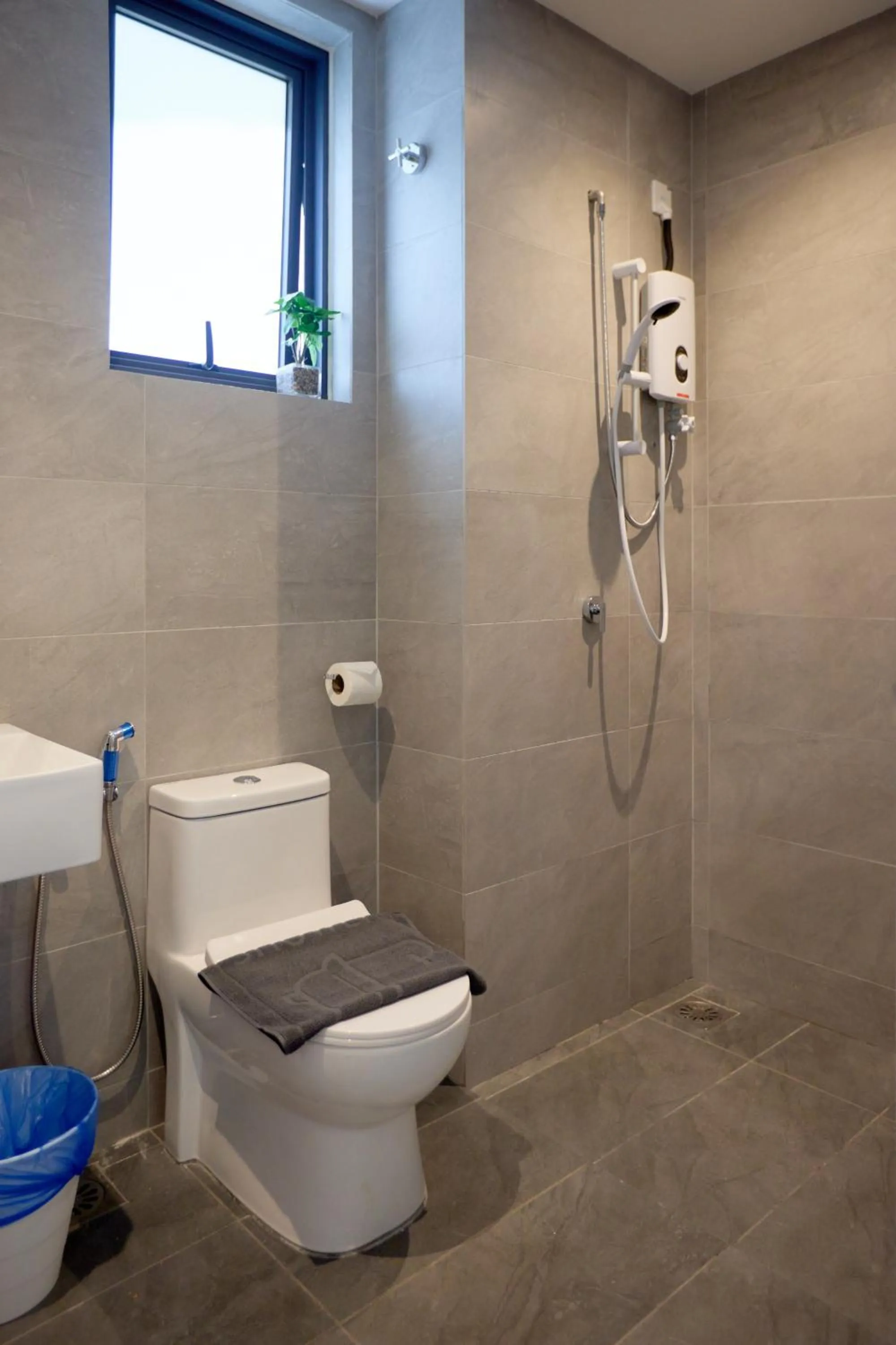 Shower in Sunsuria Forum SOHO & Residence Suites Setia Alam by MOKA