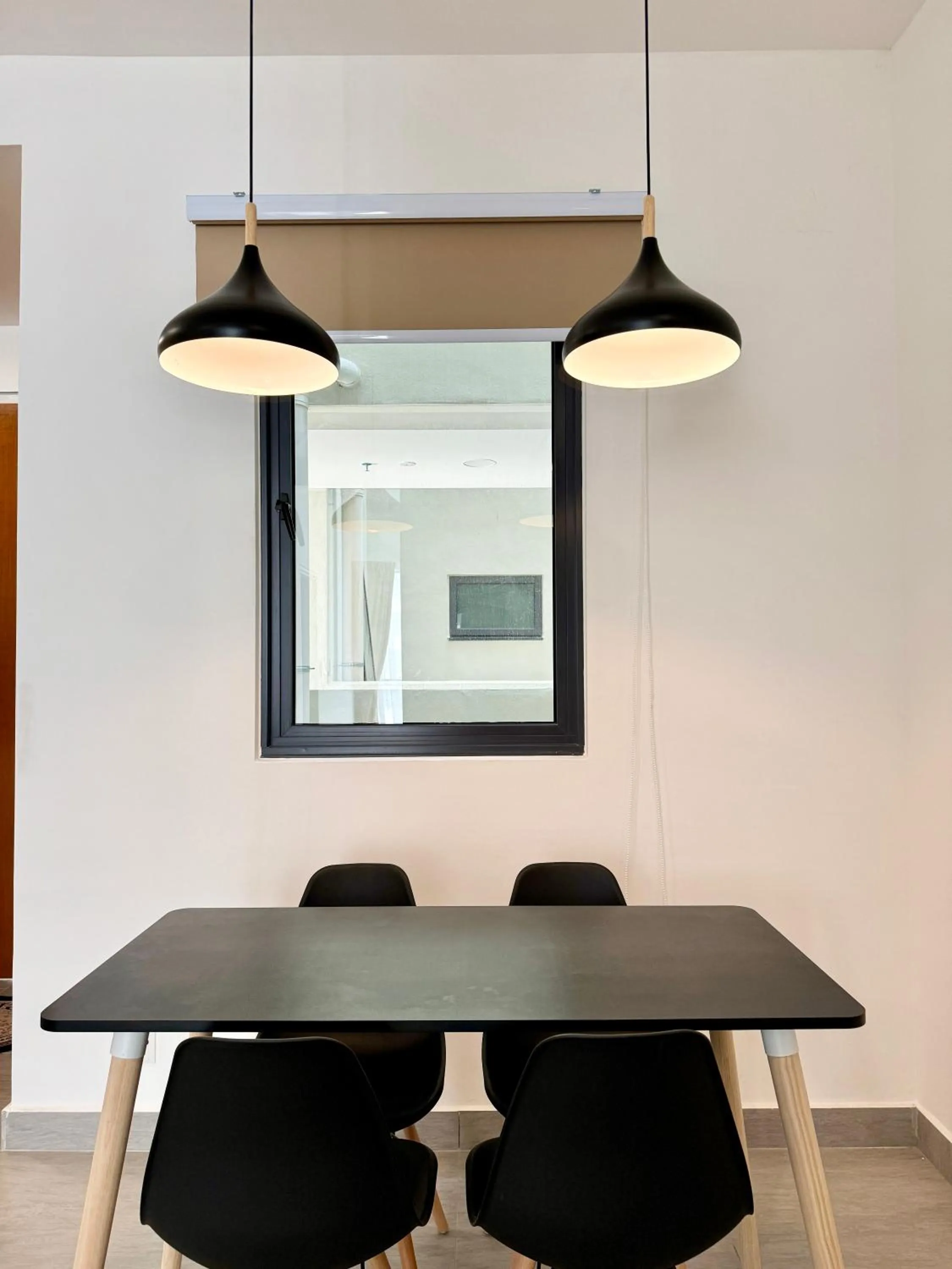 Dining area in Sunsuria Forum SOHO & Residence Suites Setia Alam by MOKA