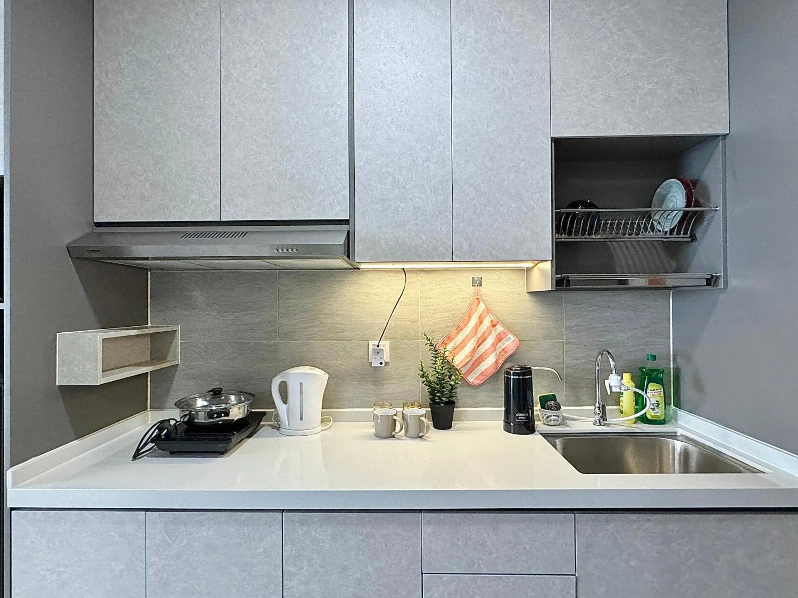 Kitchen or kitchenette in Sunsuria Forum SOHO & Residence Suites Setia Alam by MOKA