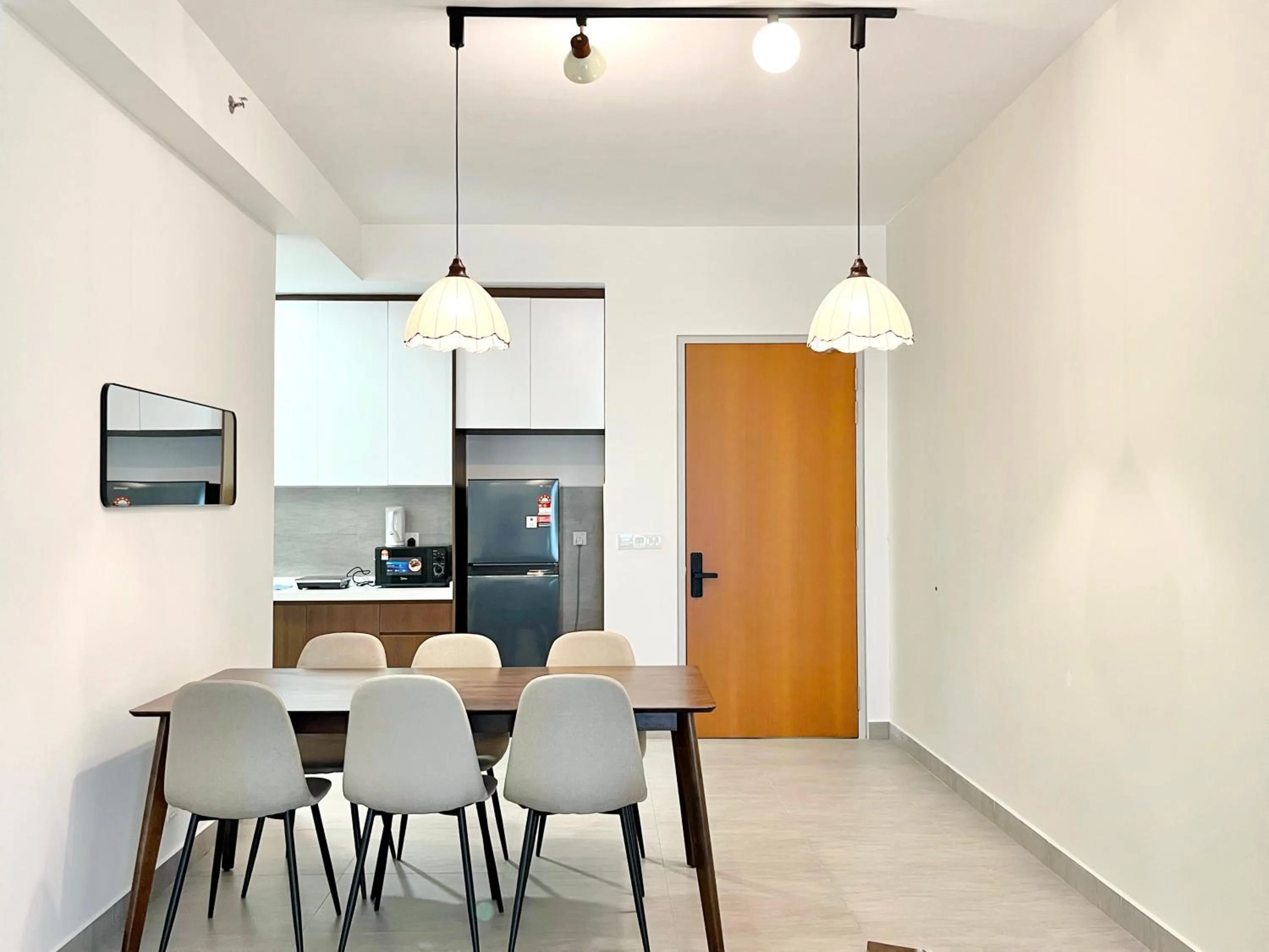 Seating area in Sunsuria Forum SOHO & Residence Suites Setia Alam by MOKA