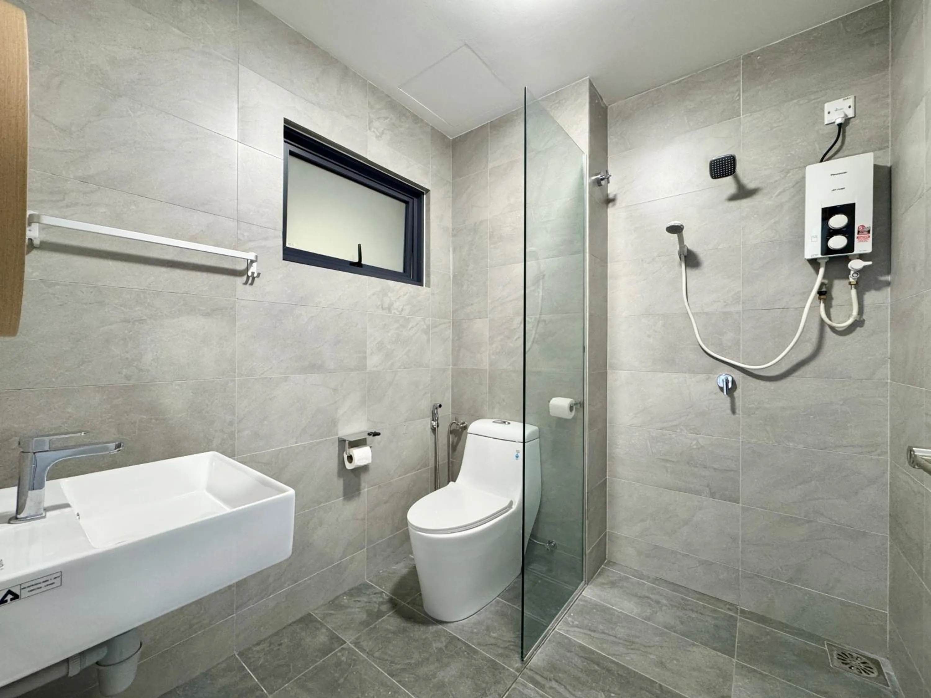 Toilet in Sunsuria Forum SOHO & Residence Suites Setia Alam by MOKA