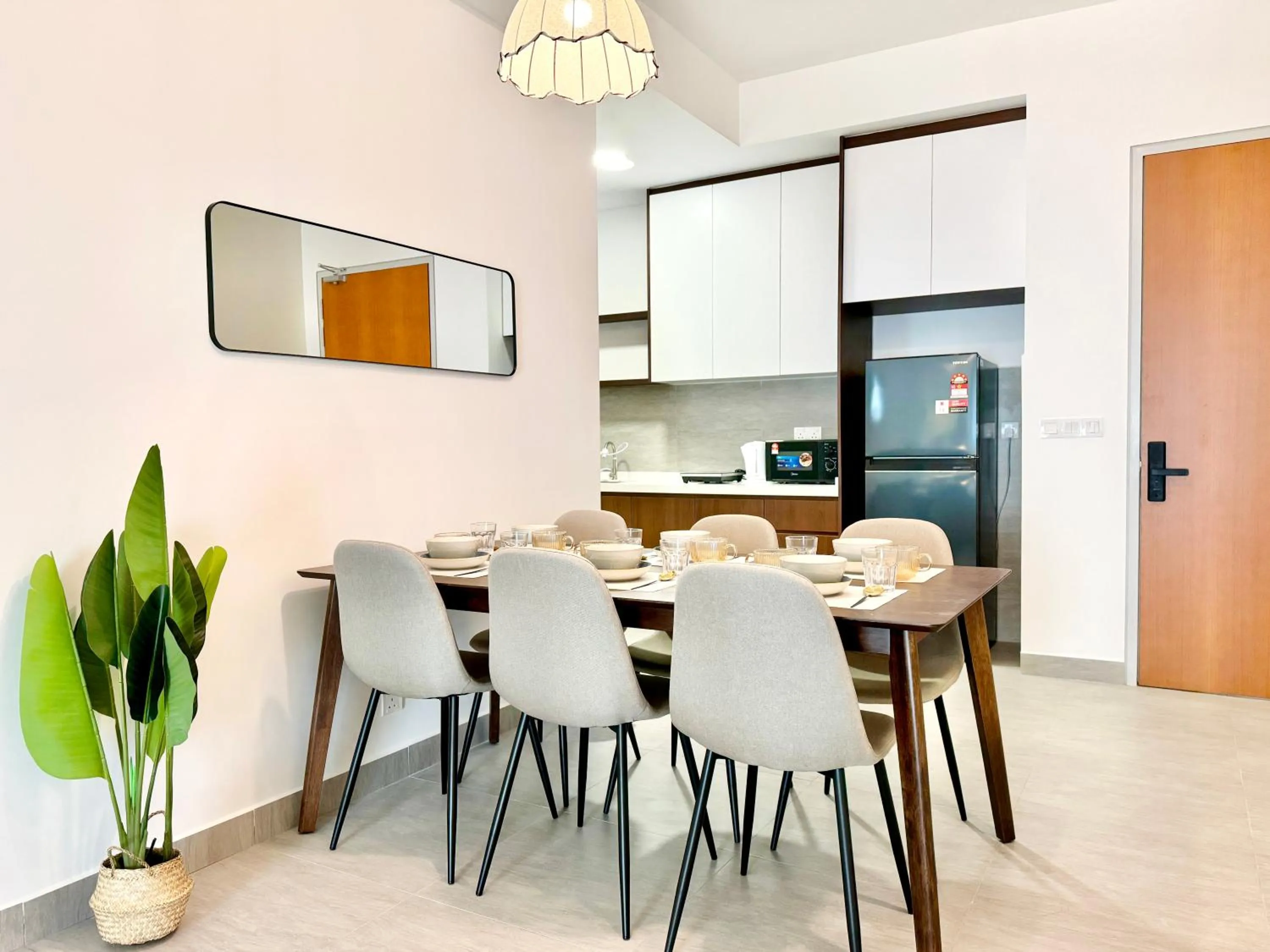 Kitchen or kitchenette in Sunsuria Forum SOHO & Residence Suites Setia Alam by MOKA