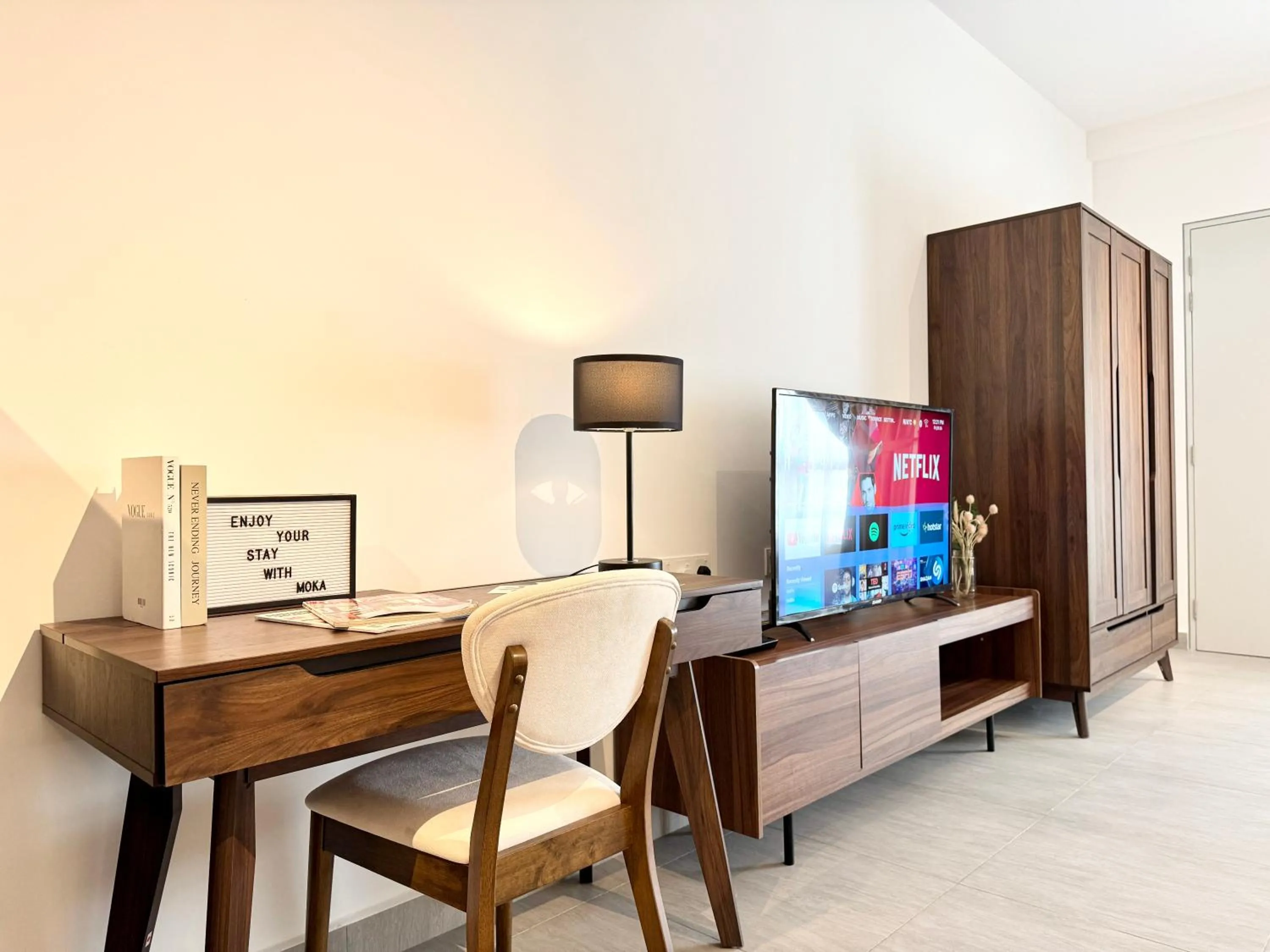 Living room in Sunsuria Forum SOHO & Residence Suites Setia Alam by MOKA