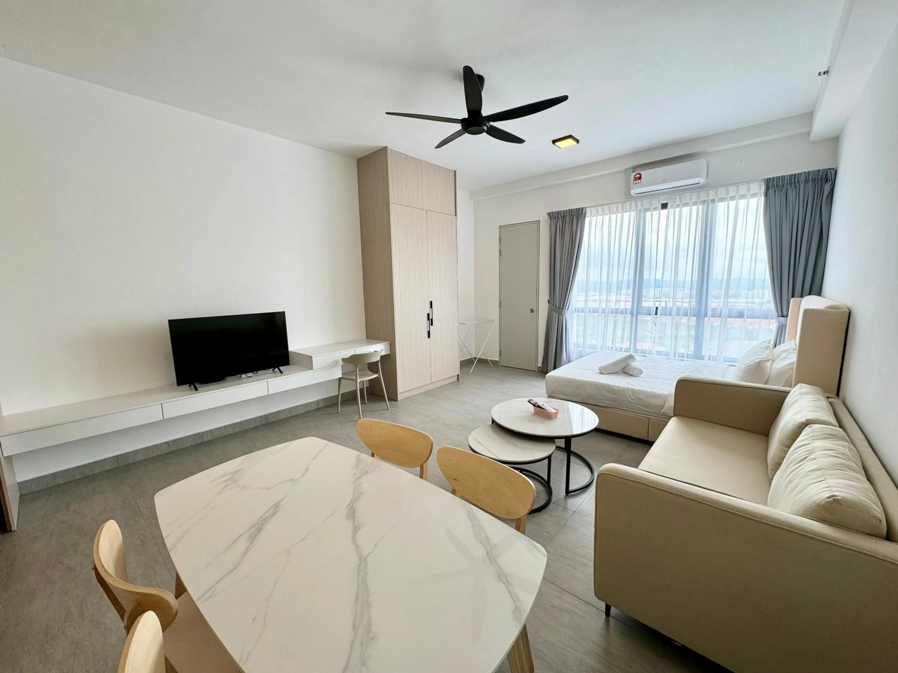 TV and multimedia in Sunsuria Forum SOHO & Residence Suites Setia Alam by MOKA