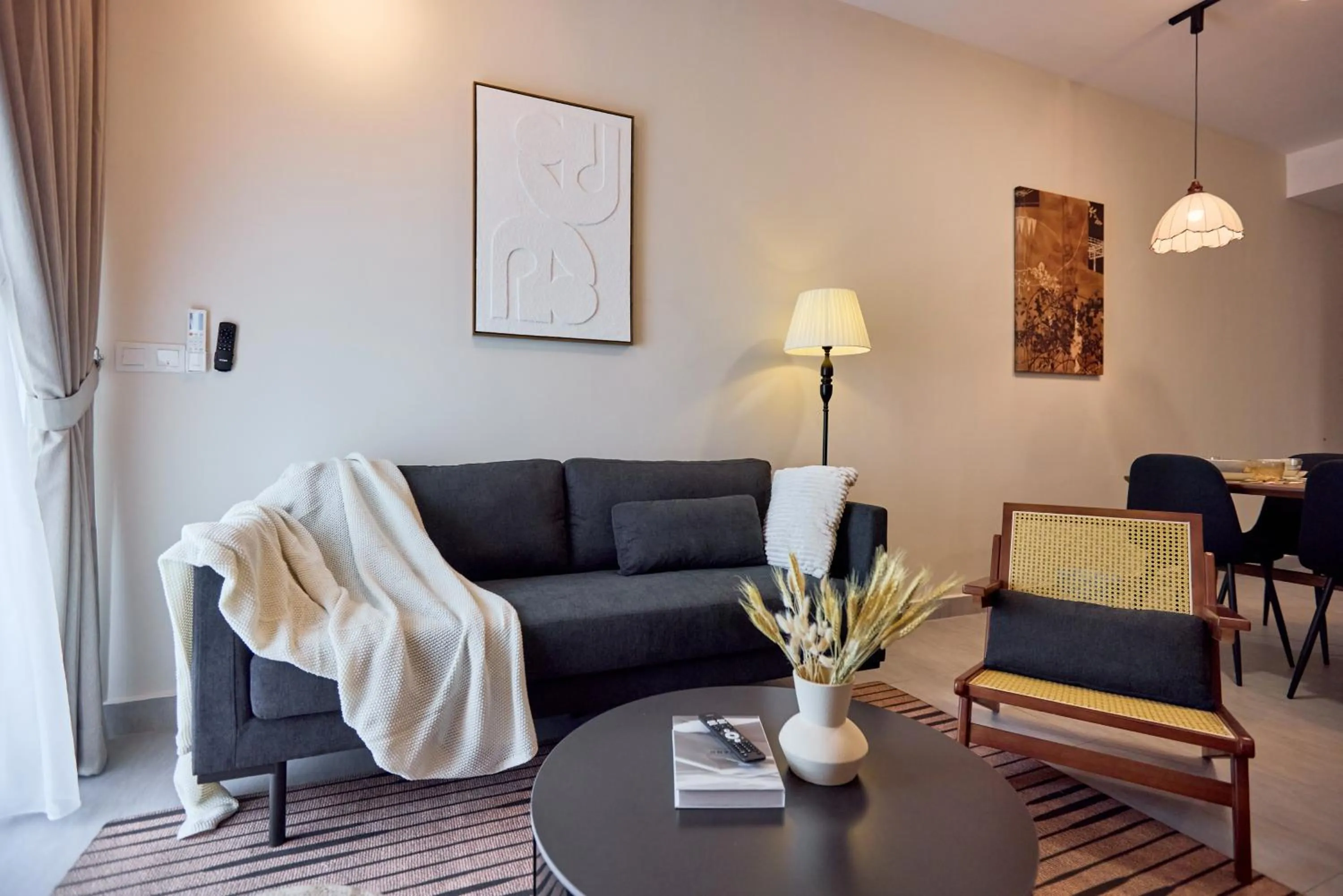 Living room in Sunsuria Forum SOHO & Residence Suites Setia Alam by MOKA