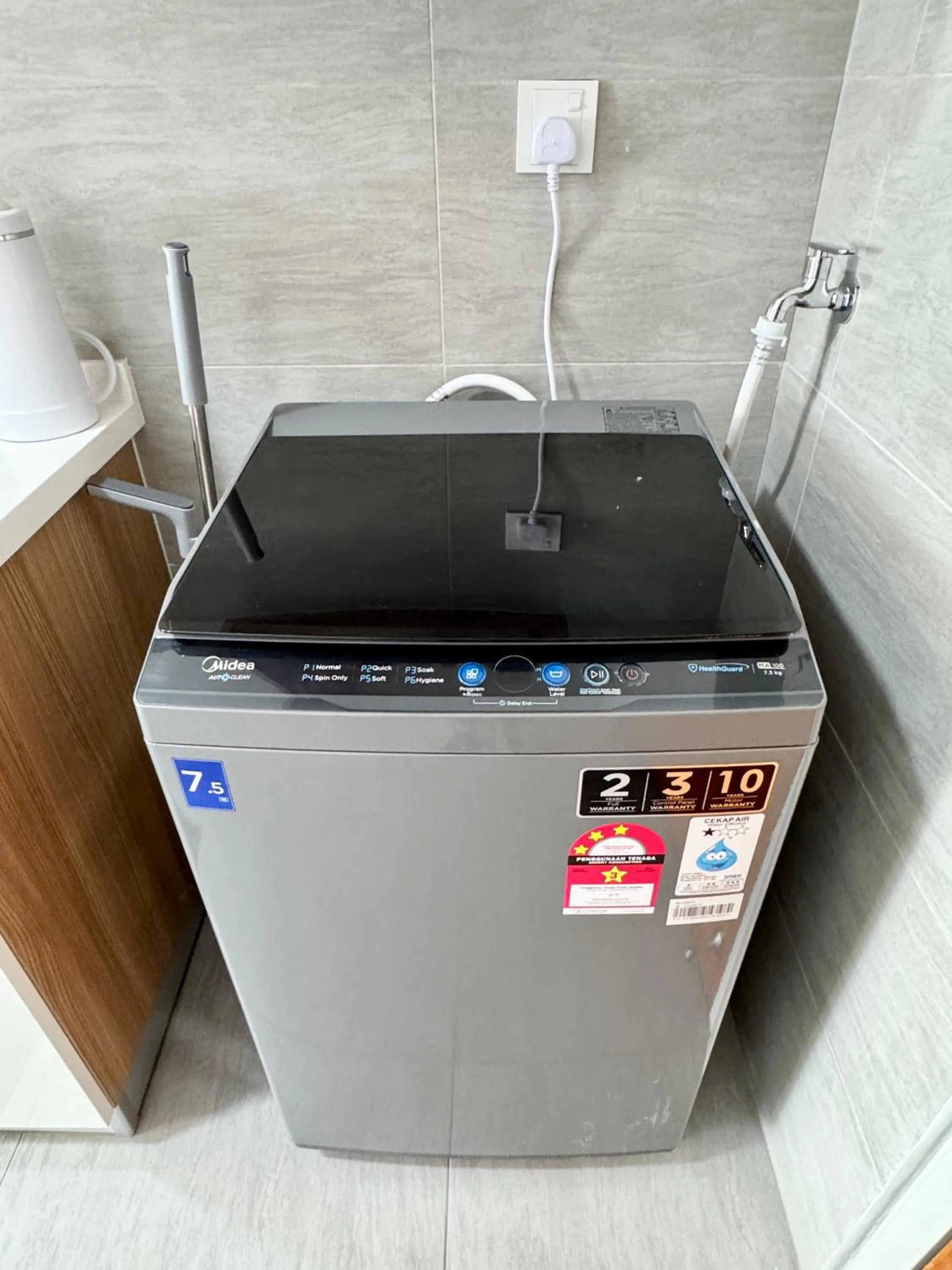 washing machine in Sunsuria Forum SOHO & Residence Suites Setia Alam by MOKA