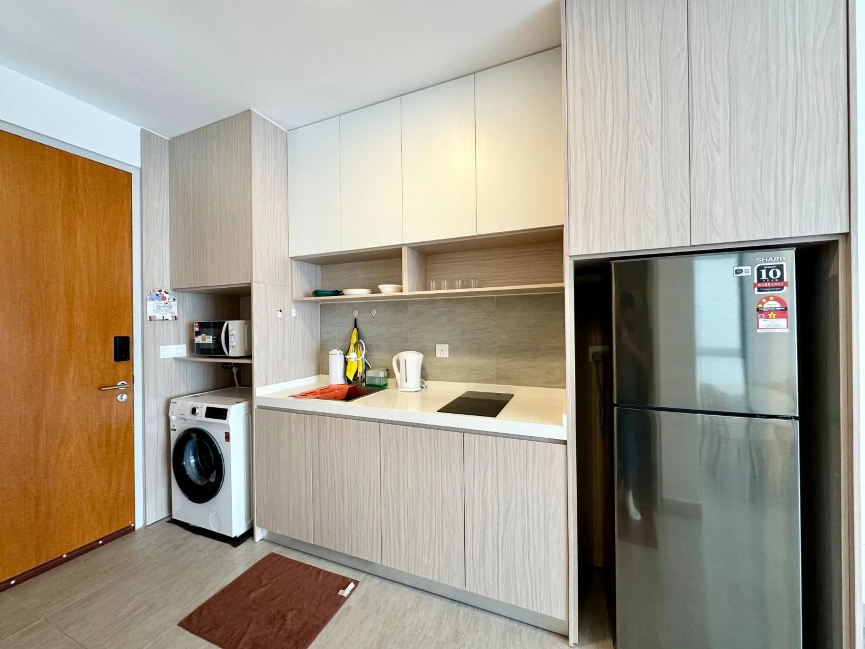 Kitchen or kitchenette in Sunsuria Forum SOHO & Residence Suites Setia Alam by MOKA