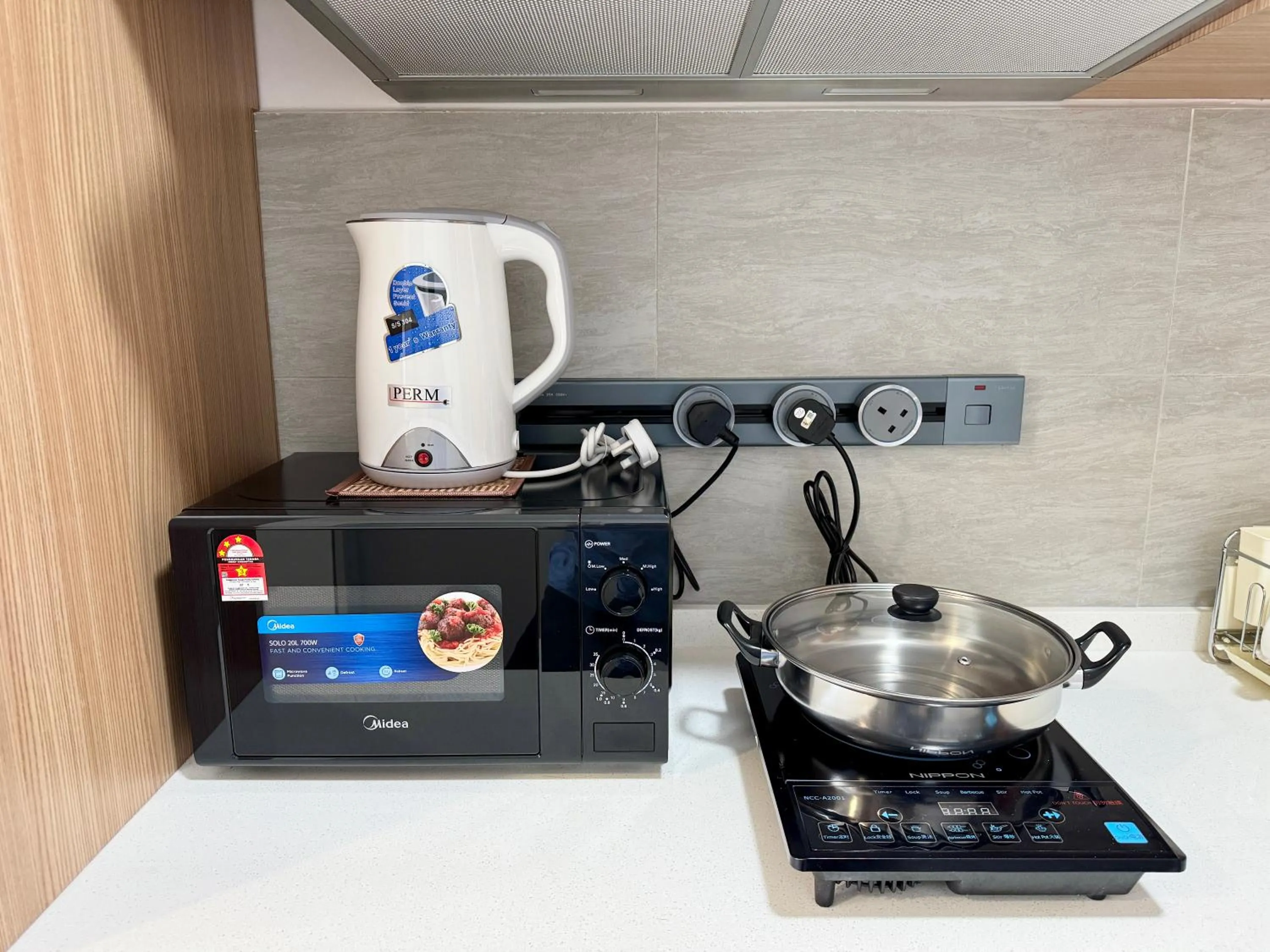 Kitchen or kitchenette in Sunsuria Forum SOHO & Residence Suites Setia Alam by MOKA