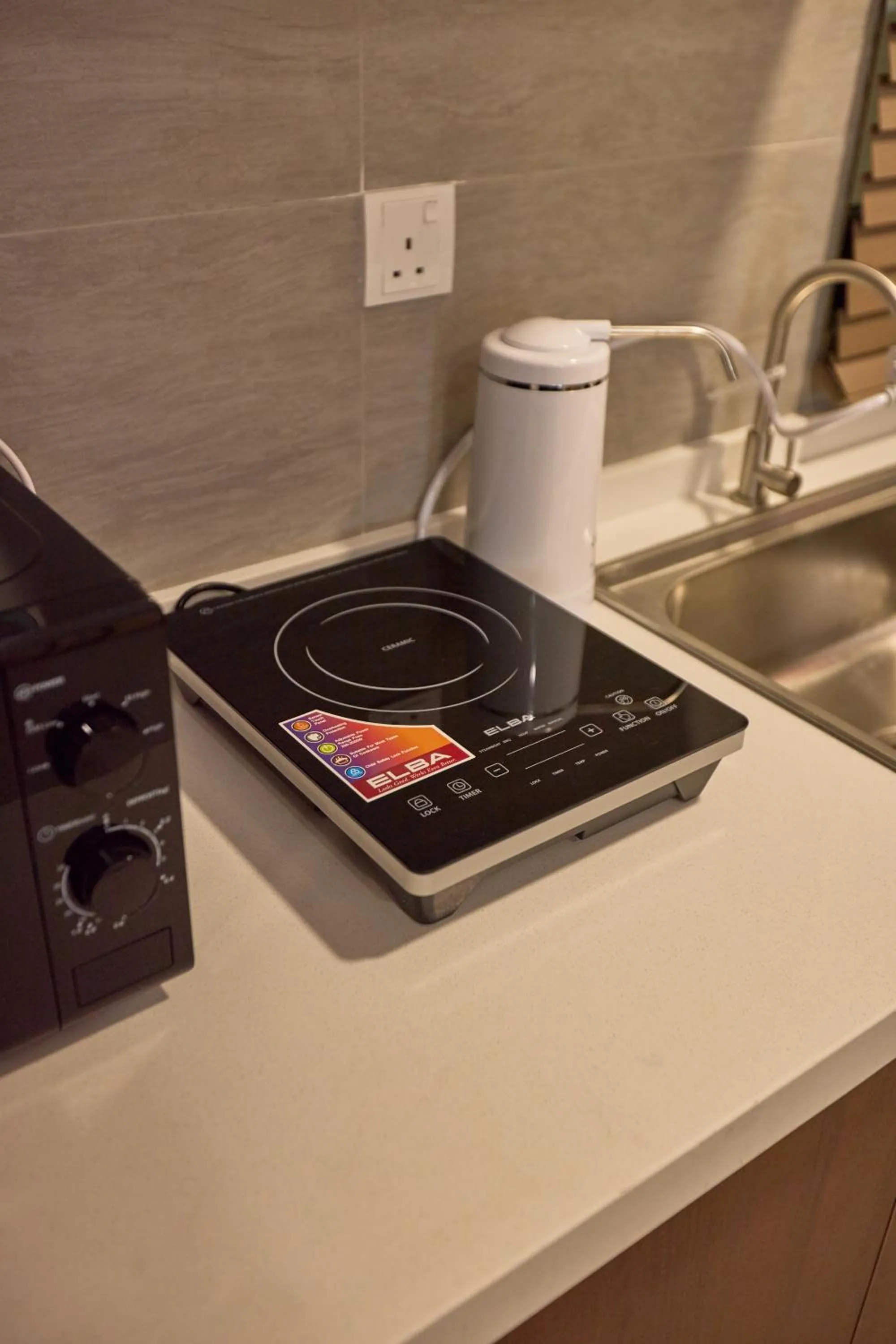 Kitchen or kitchenette in Sunsuria Forum SOHO & Residence Suites Setia Alam by MOKA