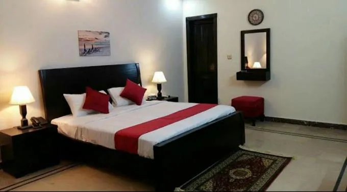 Bed in Hotel Executive Inn