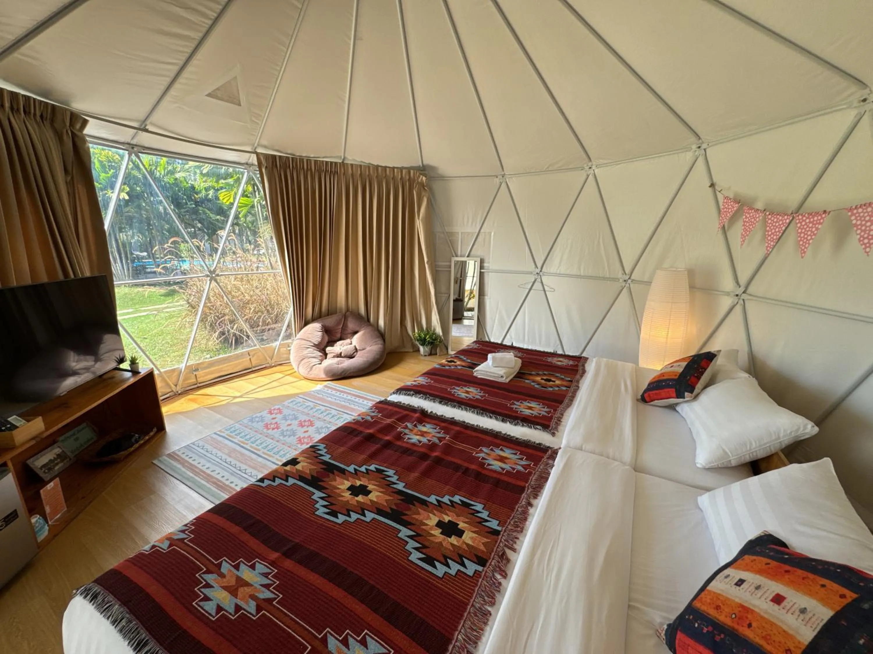 Bed in The Campster Kanchanaburi