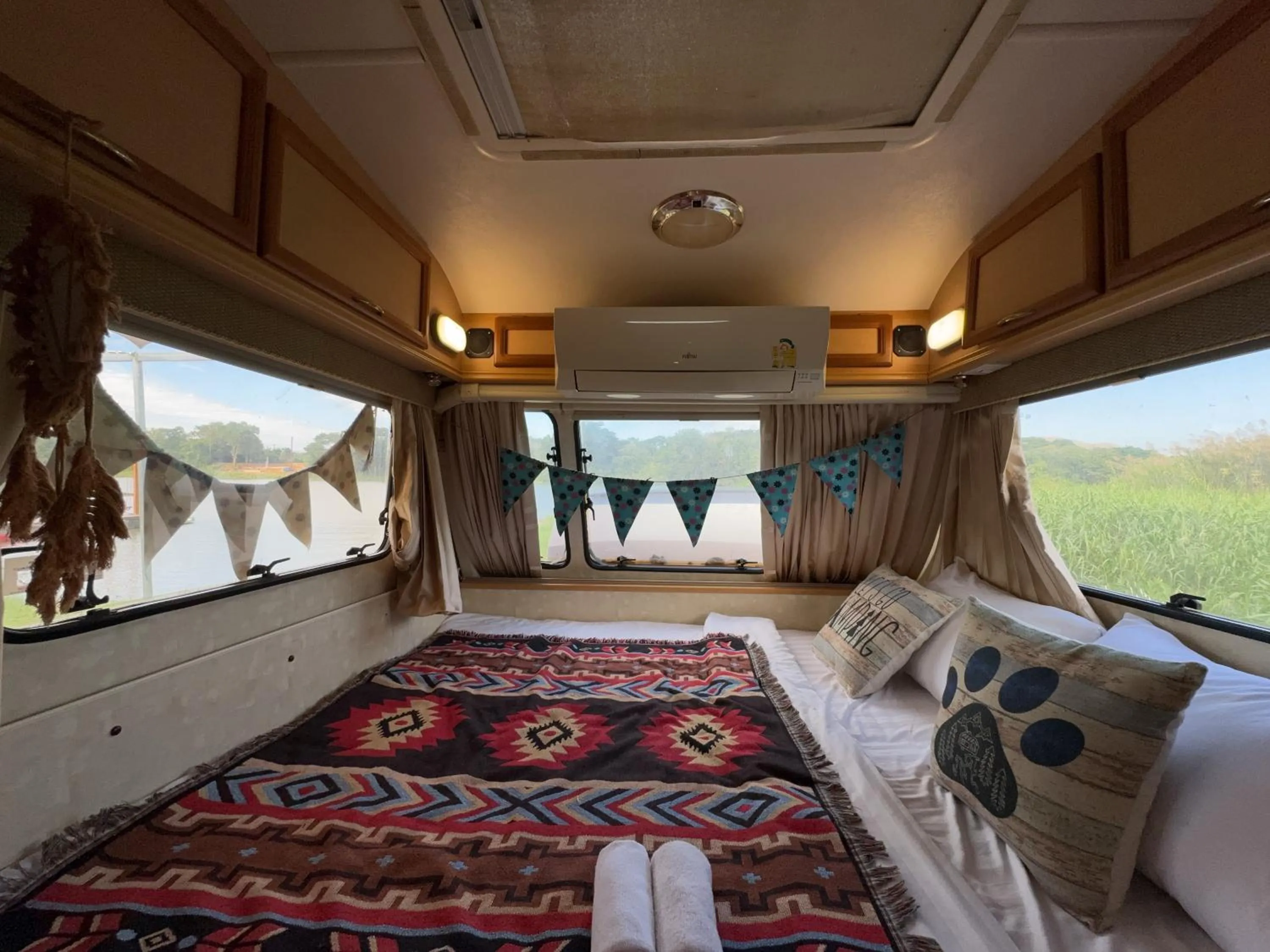 Bed in The Campster Kanchanaburi