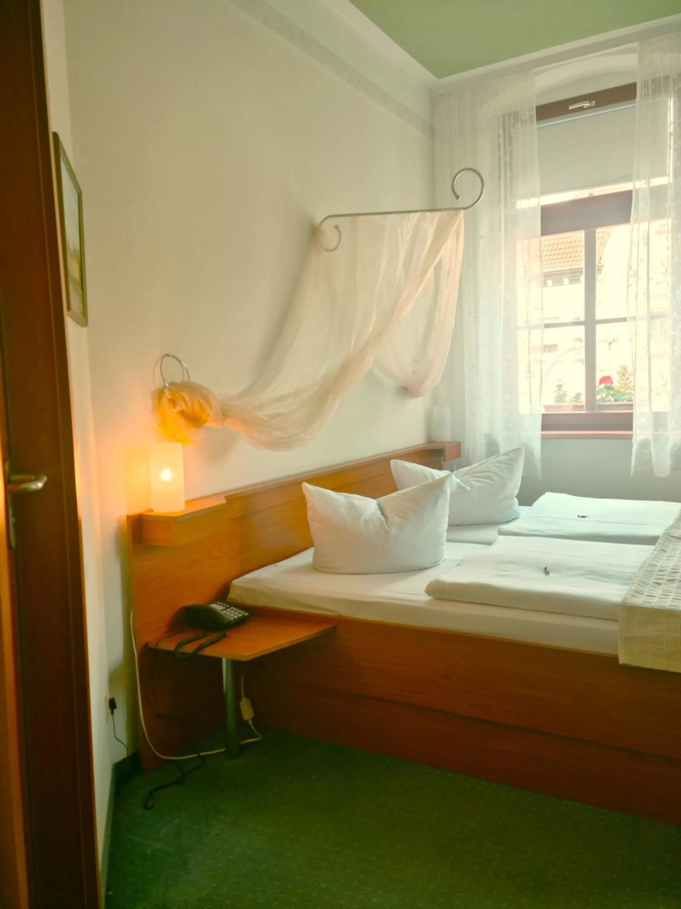 Photo of the whole room, Bed in Logis Hotel Stadt Neustadt