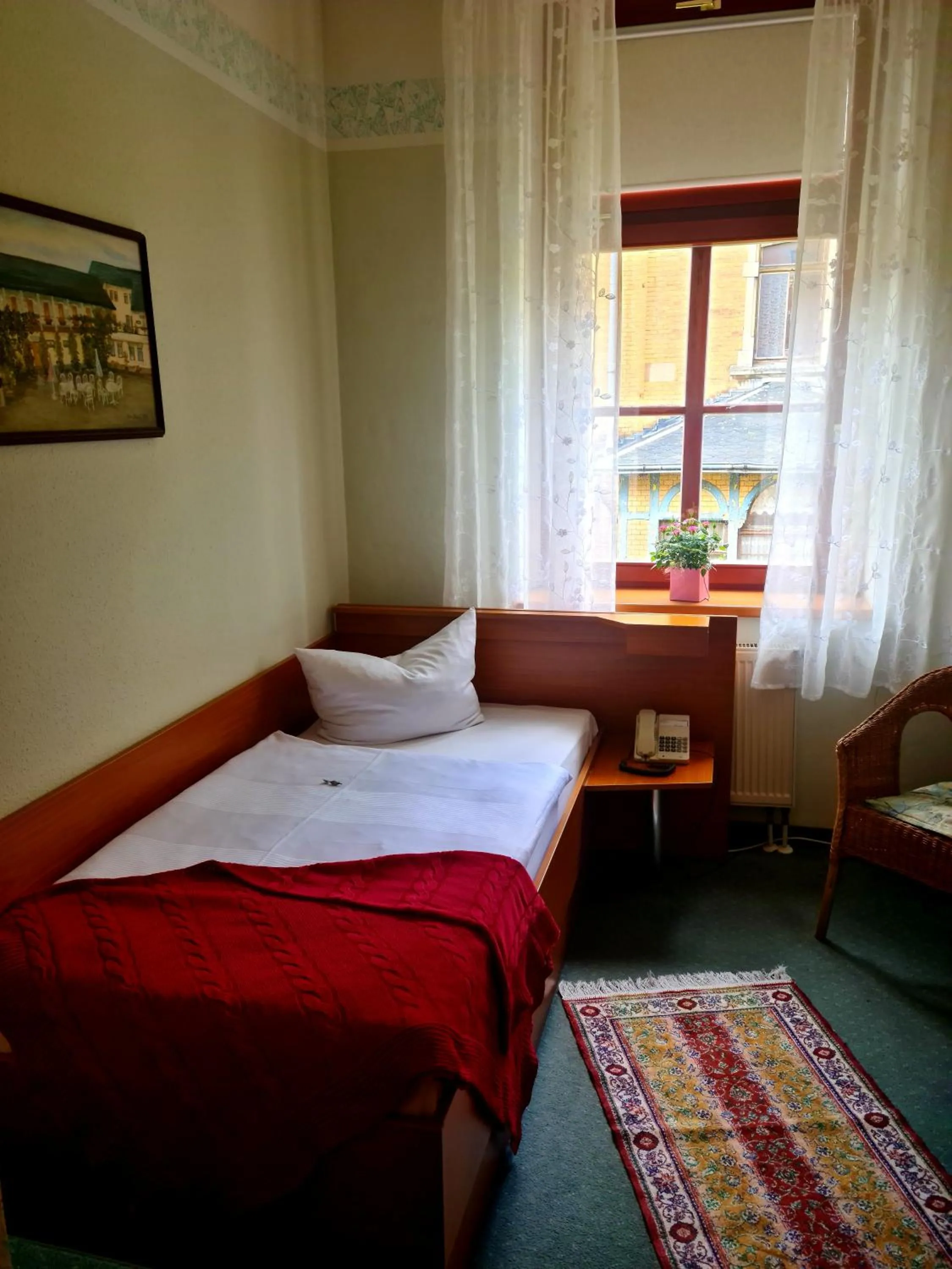 Photo of the whole room, Bed in Logis Hotel Stadt Neustadt