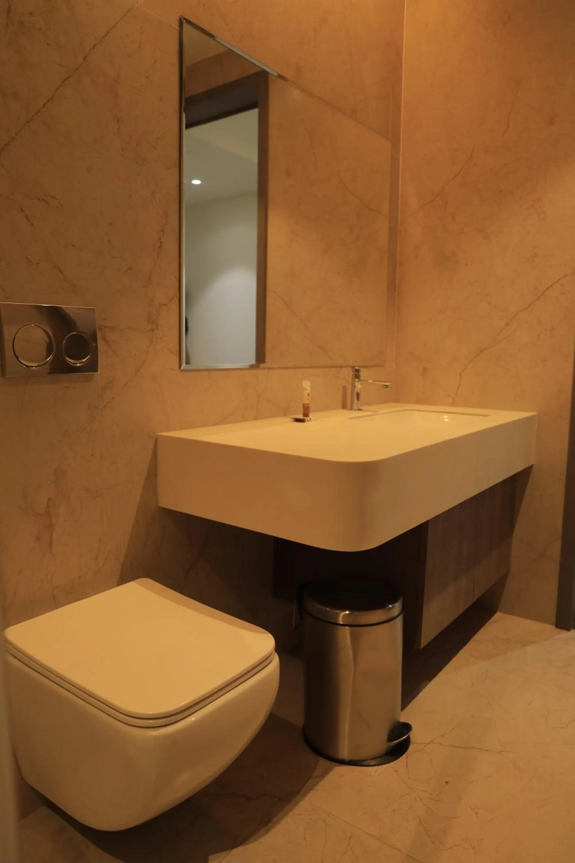 Toilet in VANTARA SUITEs