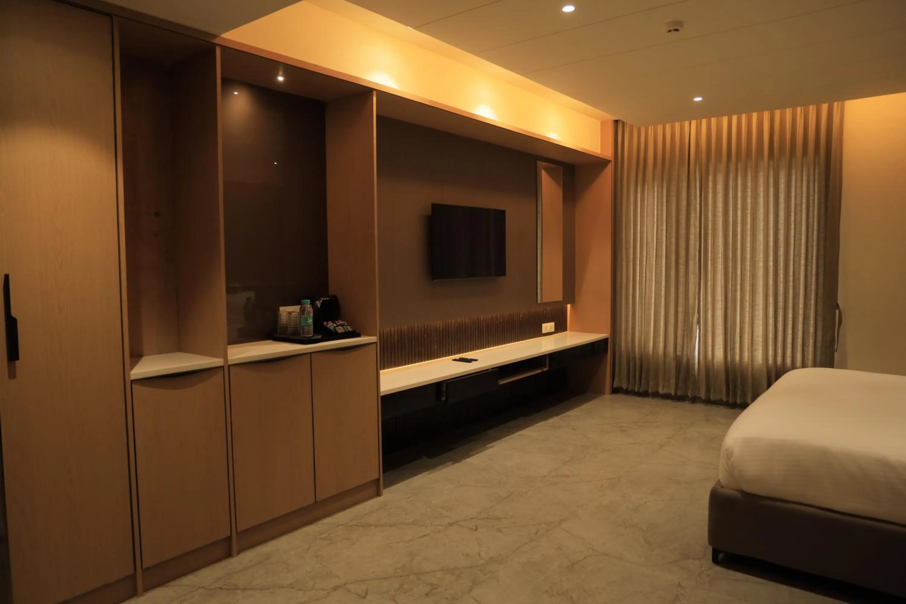 Communal lounge/ TV room, Bed in VANTARA SUITEs