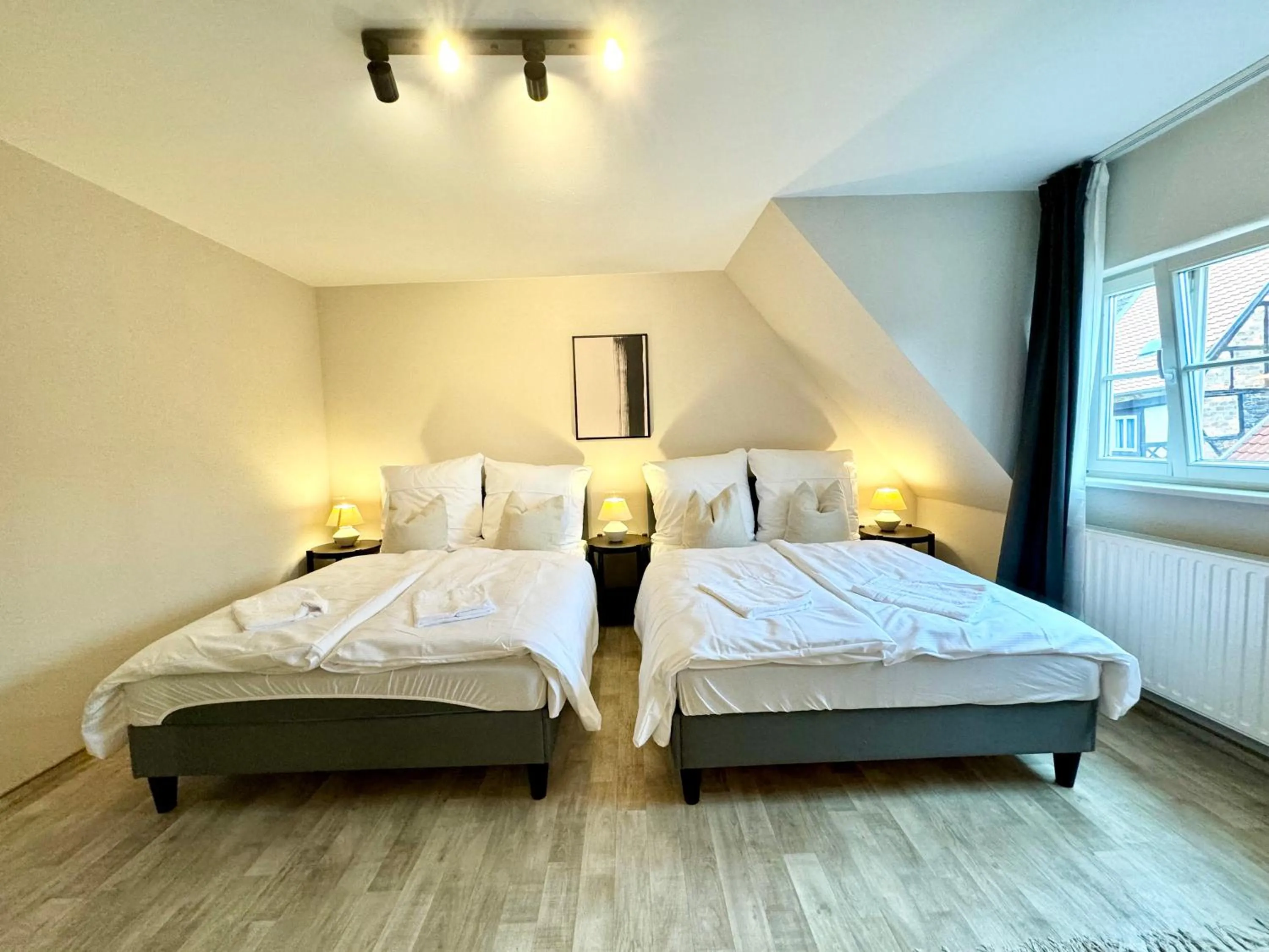 Bed in gina stay - Apartmenthaus im Zentrum von Quedlinburg