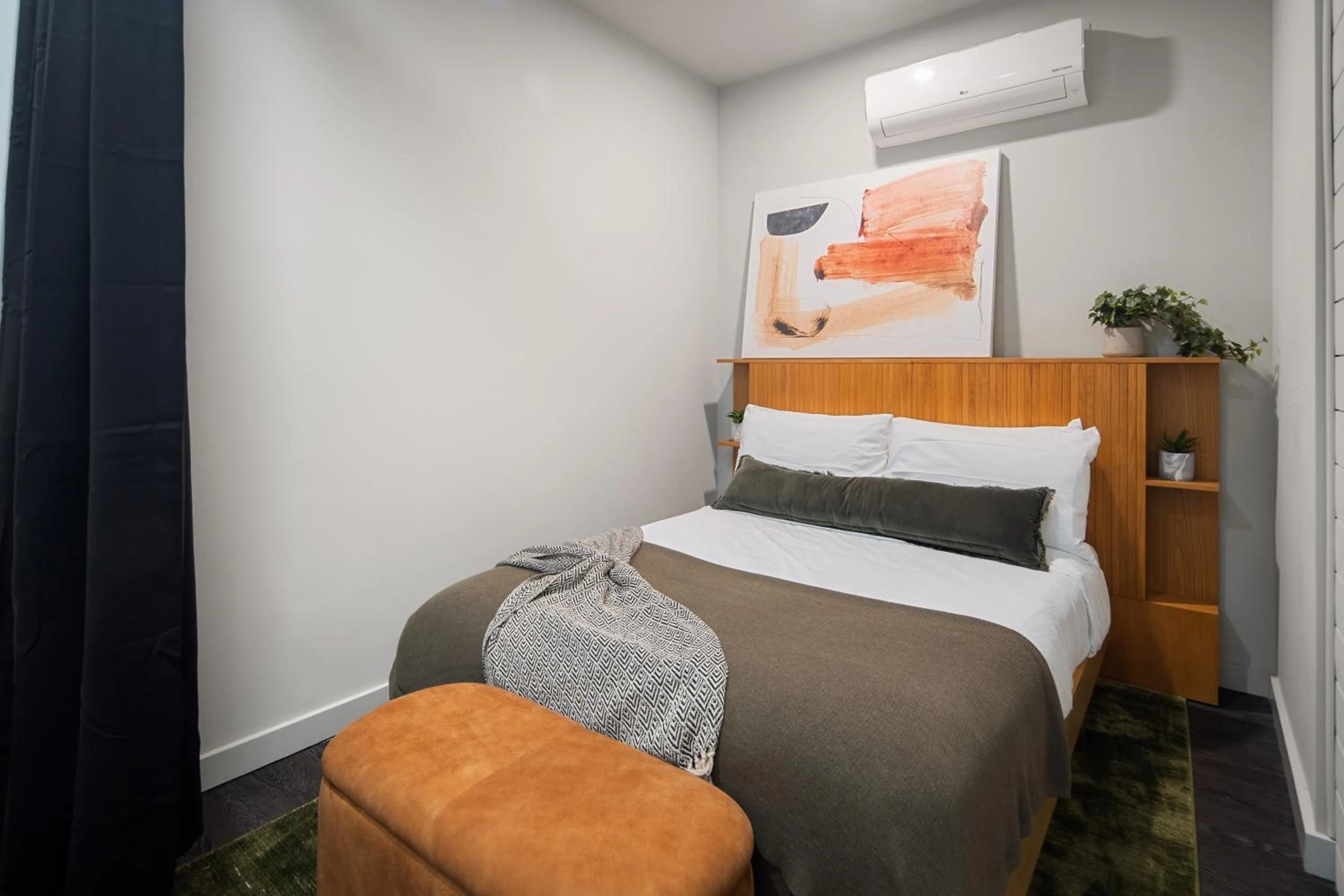 Bed in Luxury Apartments by Hyatus at The Asher