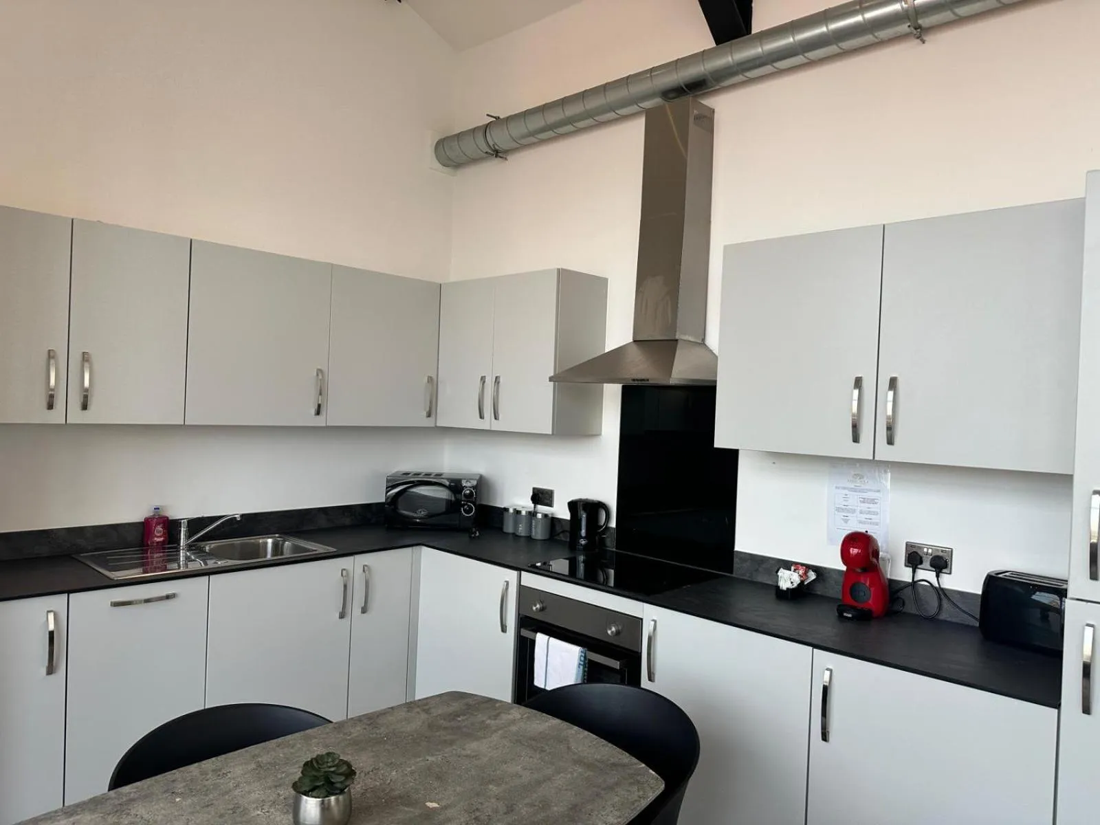 Kitchen or kitchenette in Dale Street Apartments Liverpool by Beehosting
