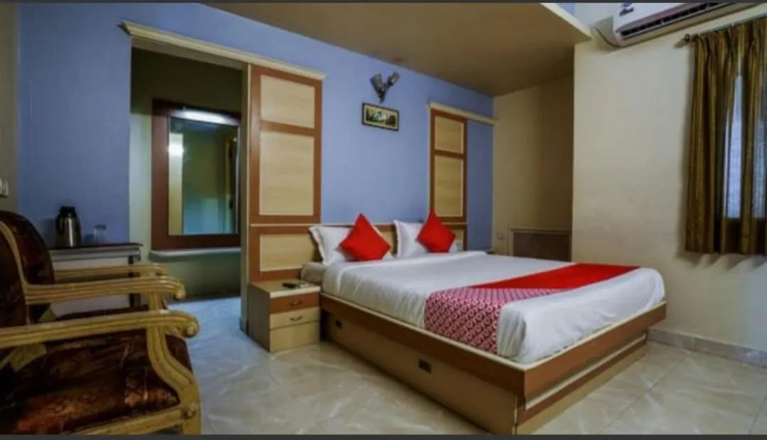 Bed in Hotel Tara International