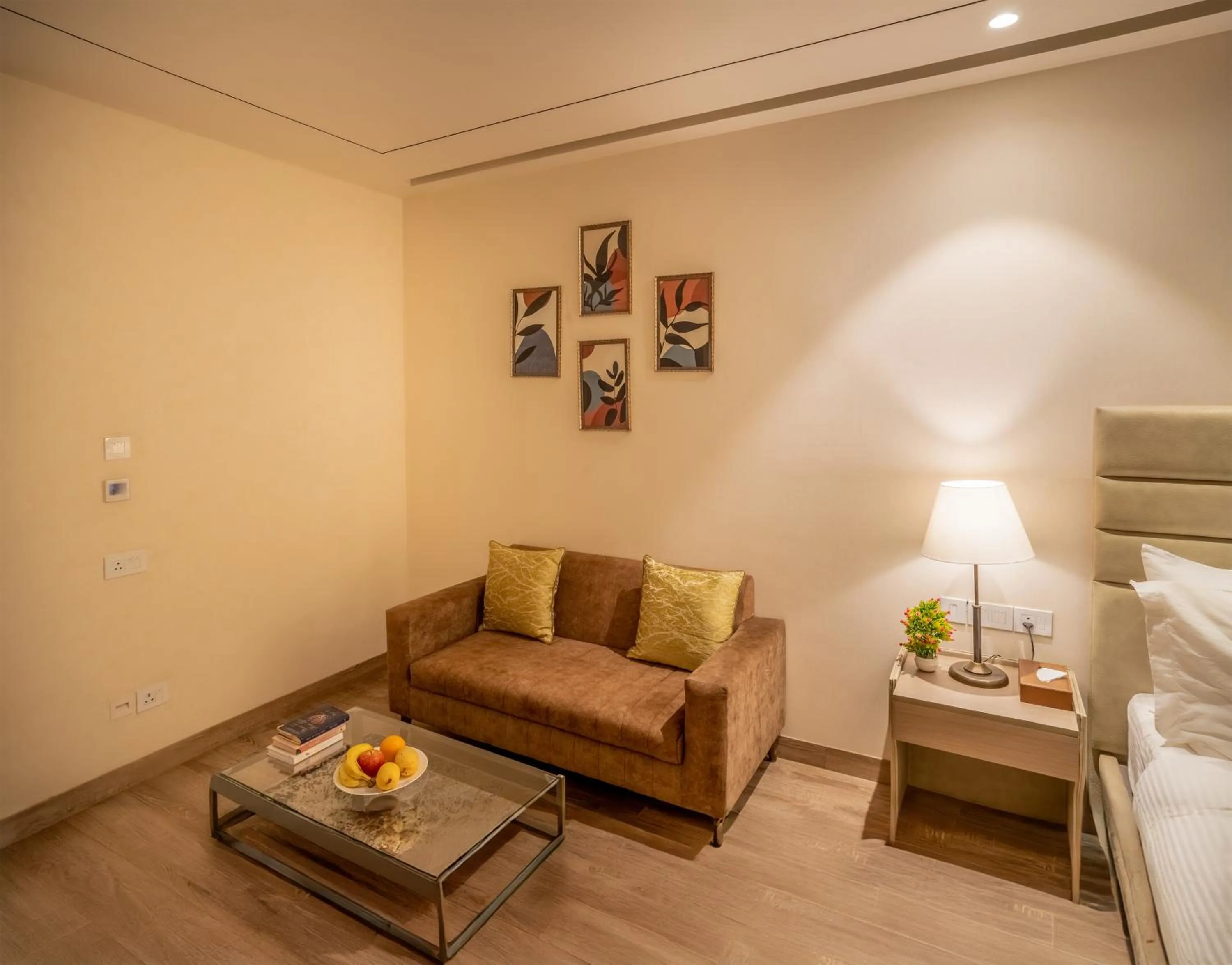 Seating area, Bed in jüSTa Residences - AIPL Joy Street, Gurgaon