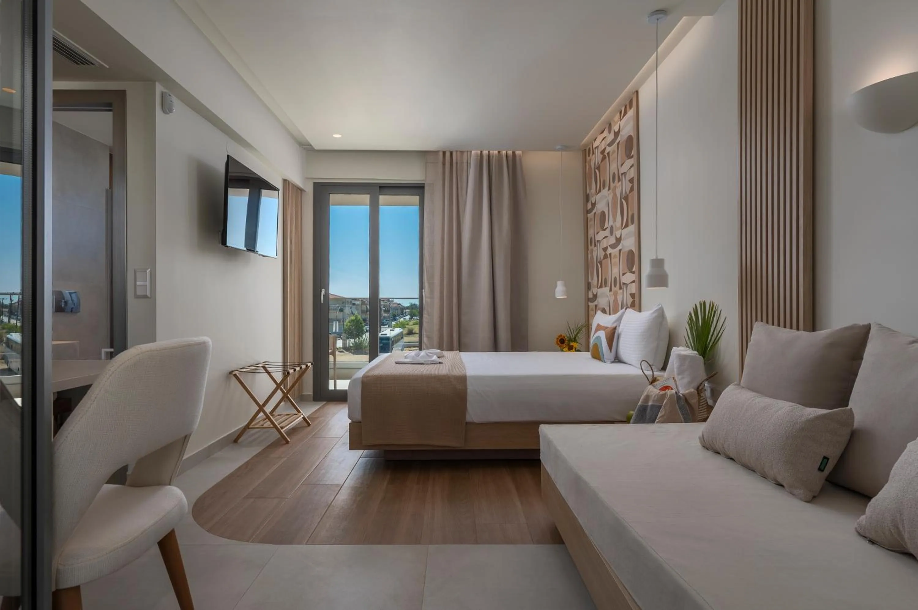 Photo of the whole room, Bed in Sandy Seaside Suites