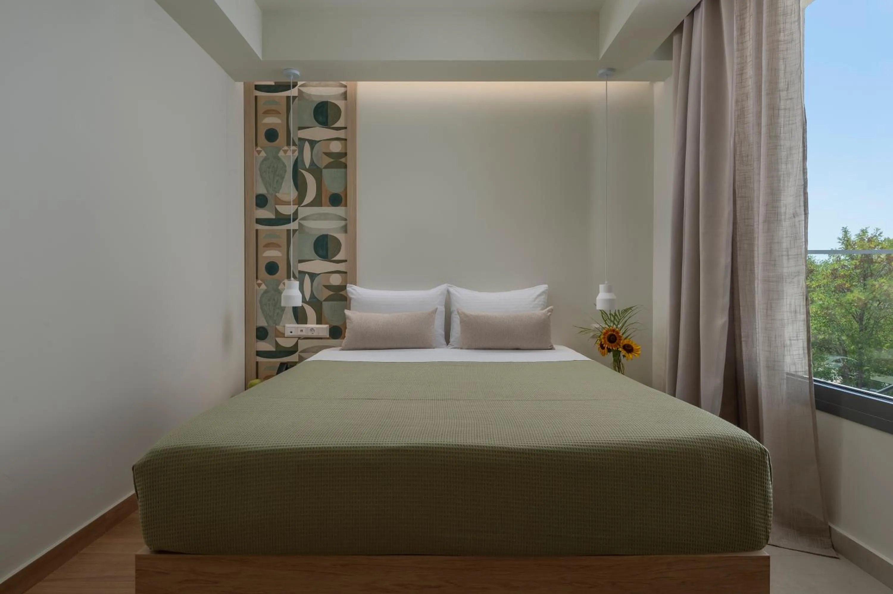 Bed in Sandy Seaside Suites