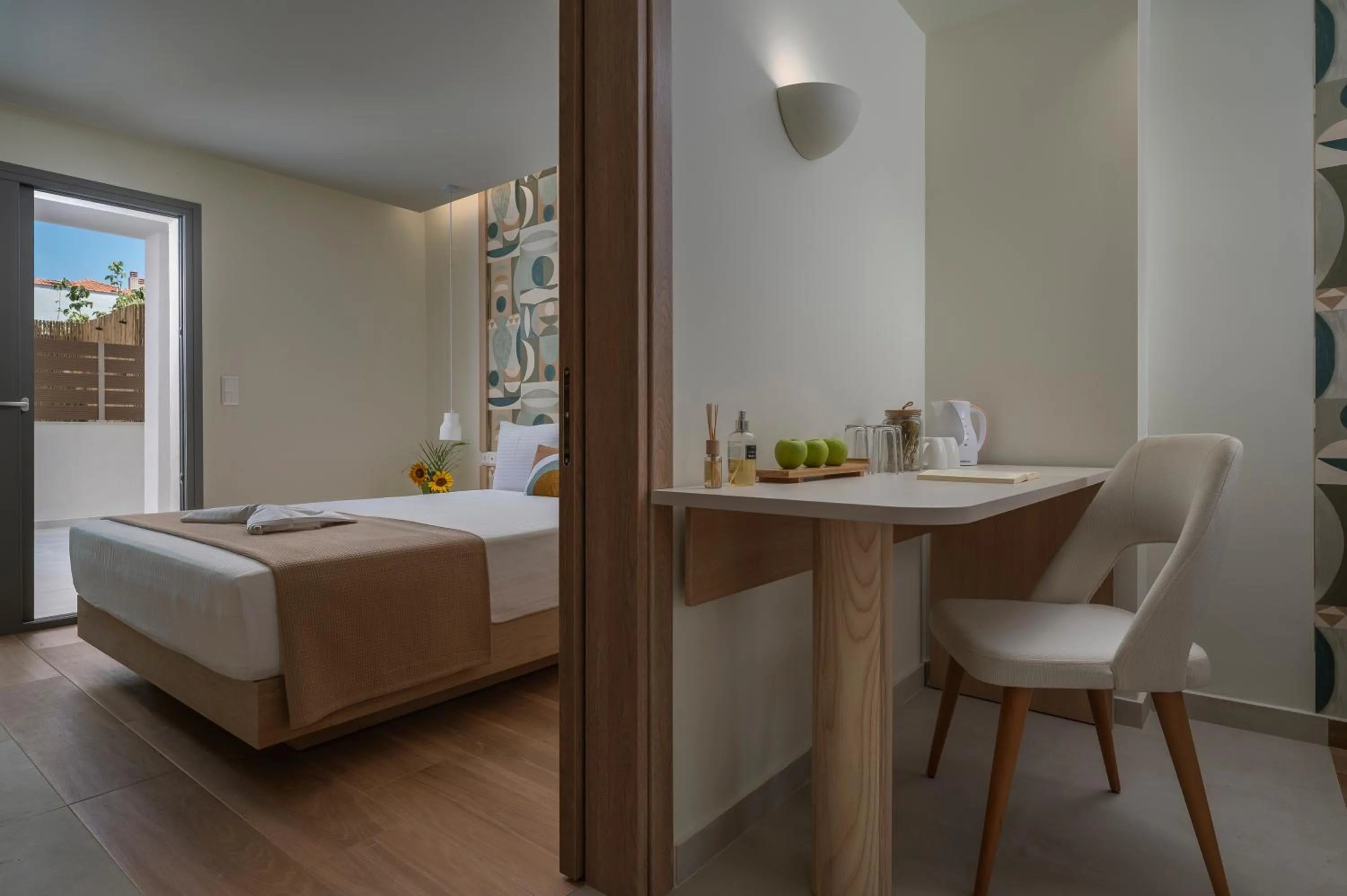 Seating area, Bed in Sandy Seaside Suites