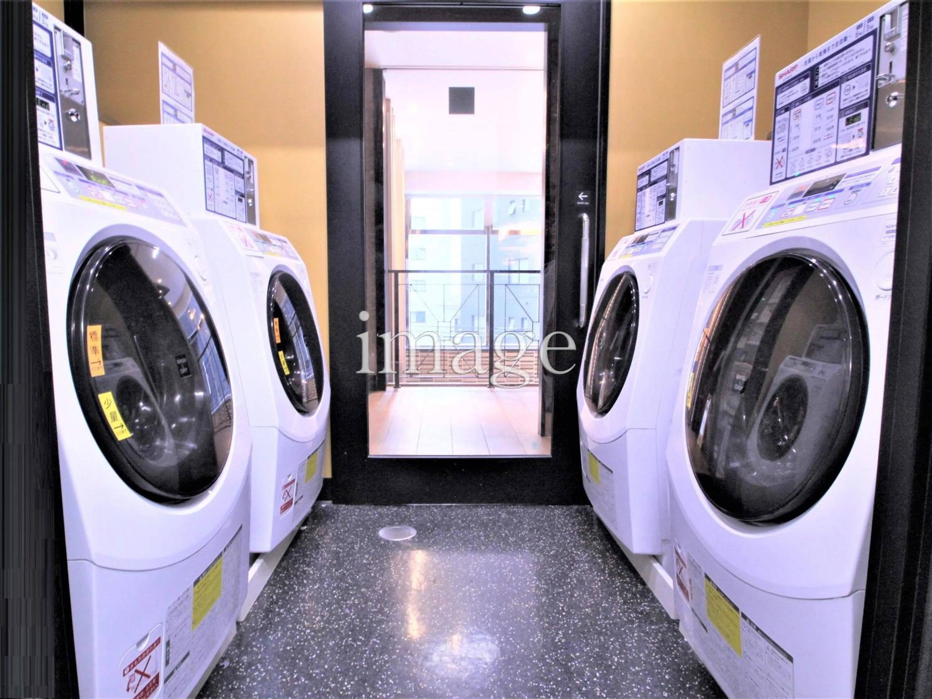 washing machine in APA Hotel Hiroshima Ekimae Shinkansenguchi