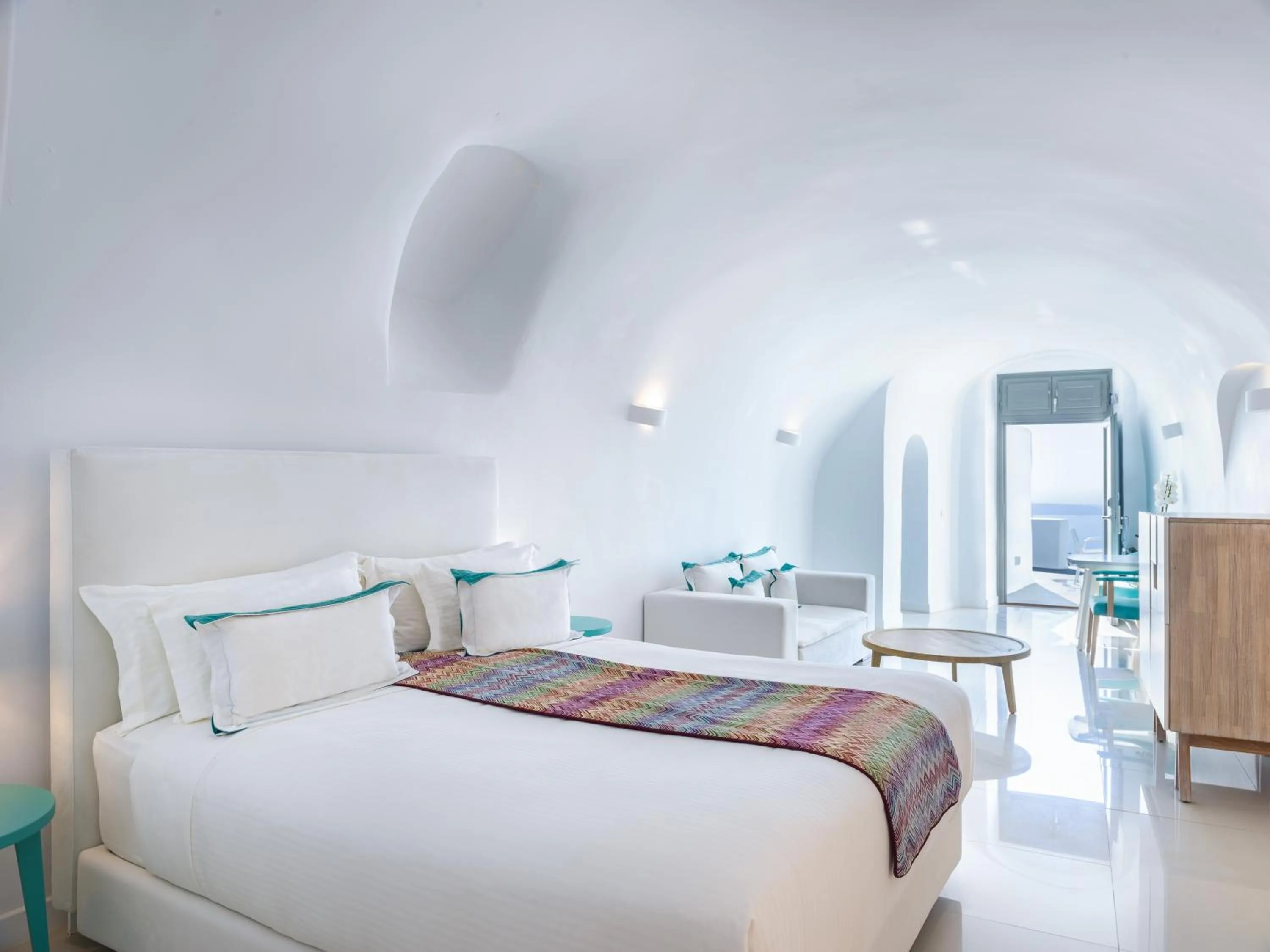 Photo of the whole room, Bed in Katikies Chromata Santorini - The Leading Hotels of the World