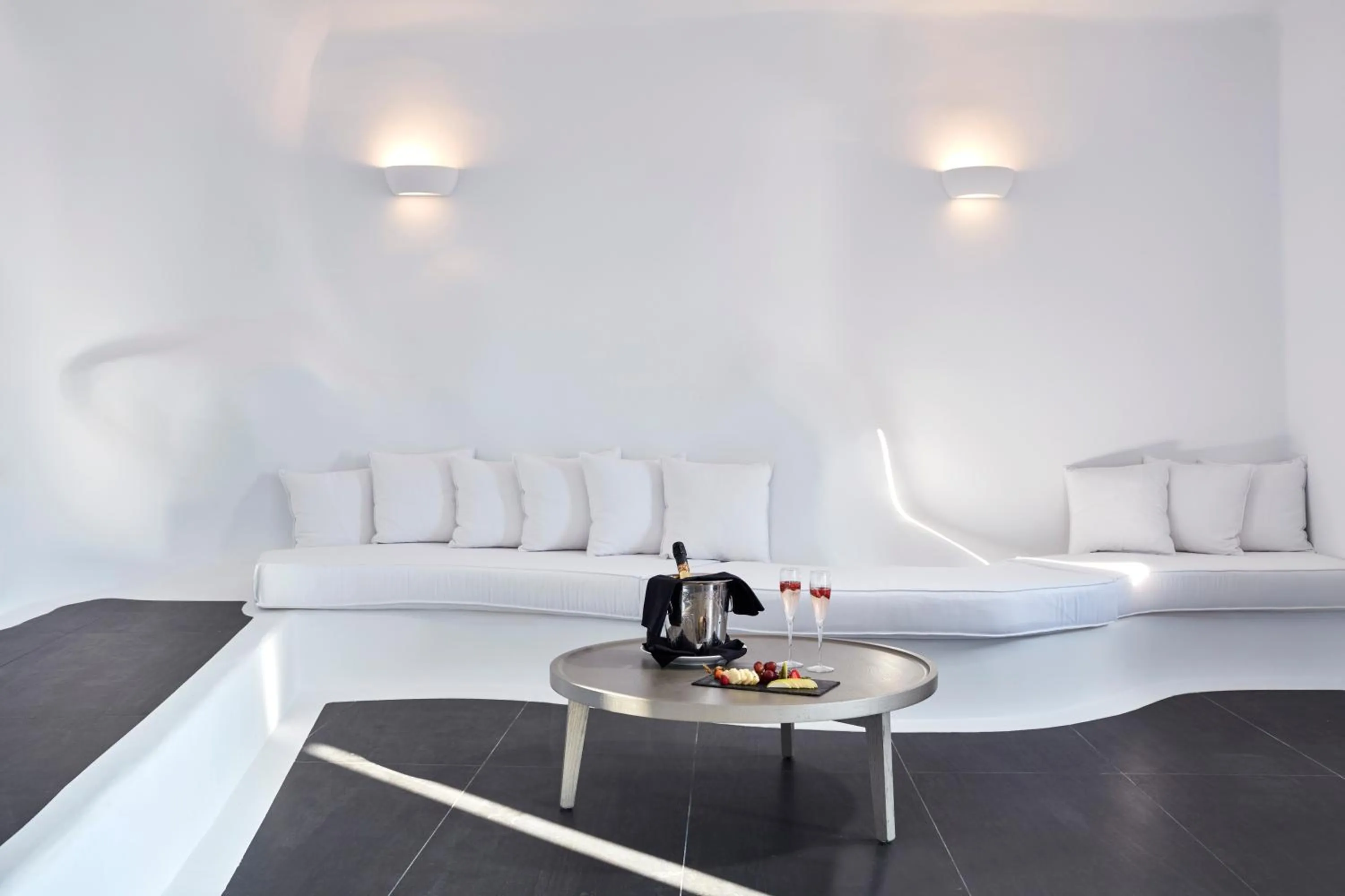 Living room in Katikies Chromata Santorini - The Leading Hotels of the World