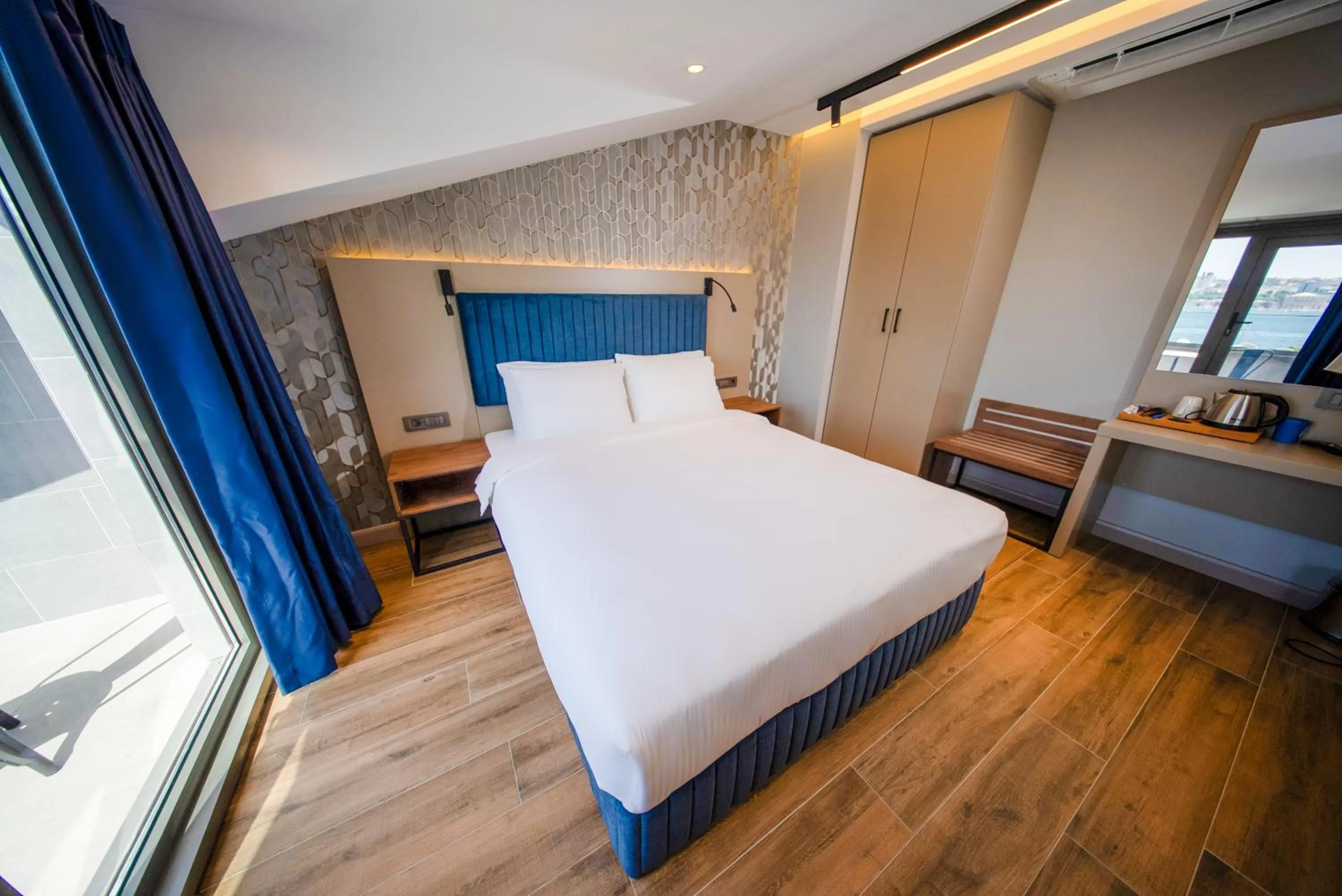 Bed in The Palm Bosphorus Hotel