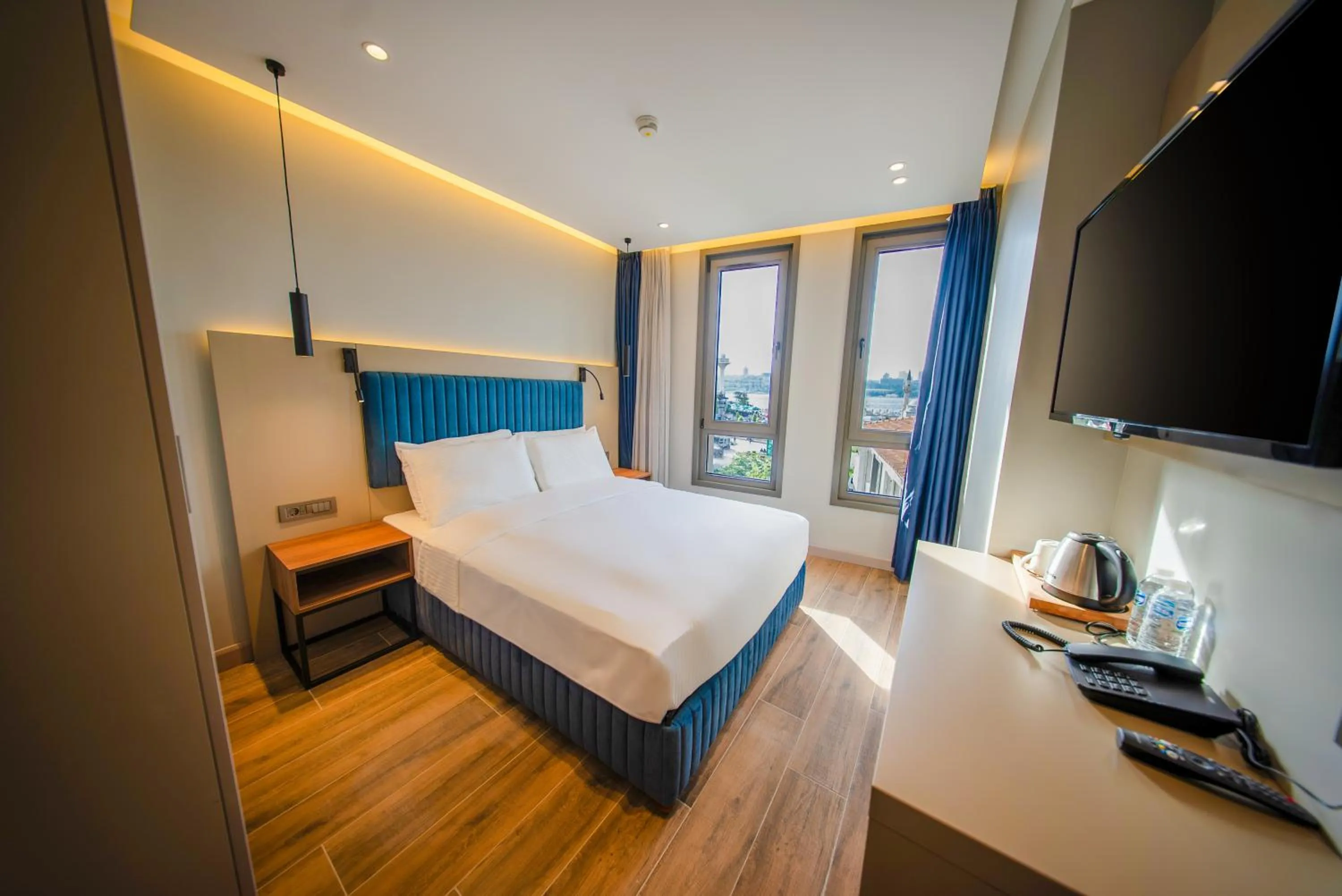 Bed in The Palm Bosphorus Hotel