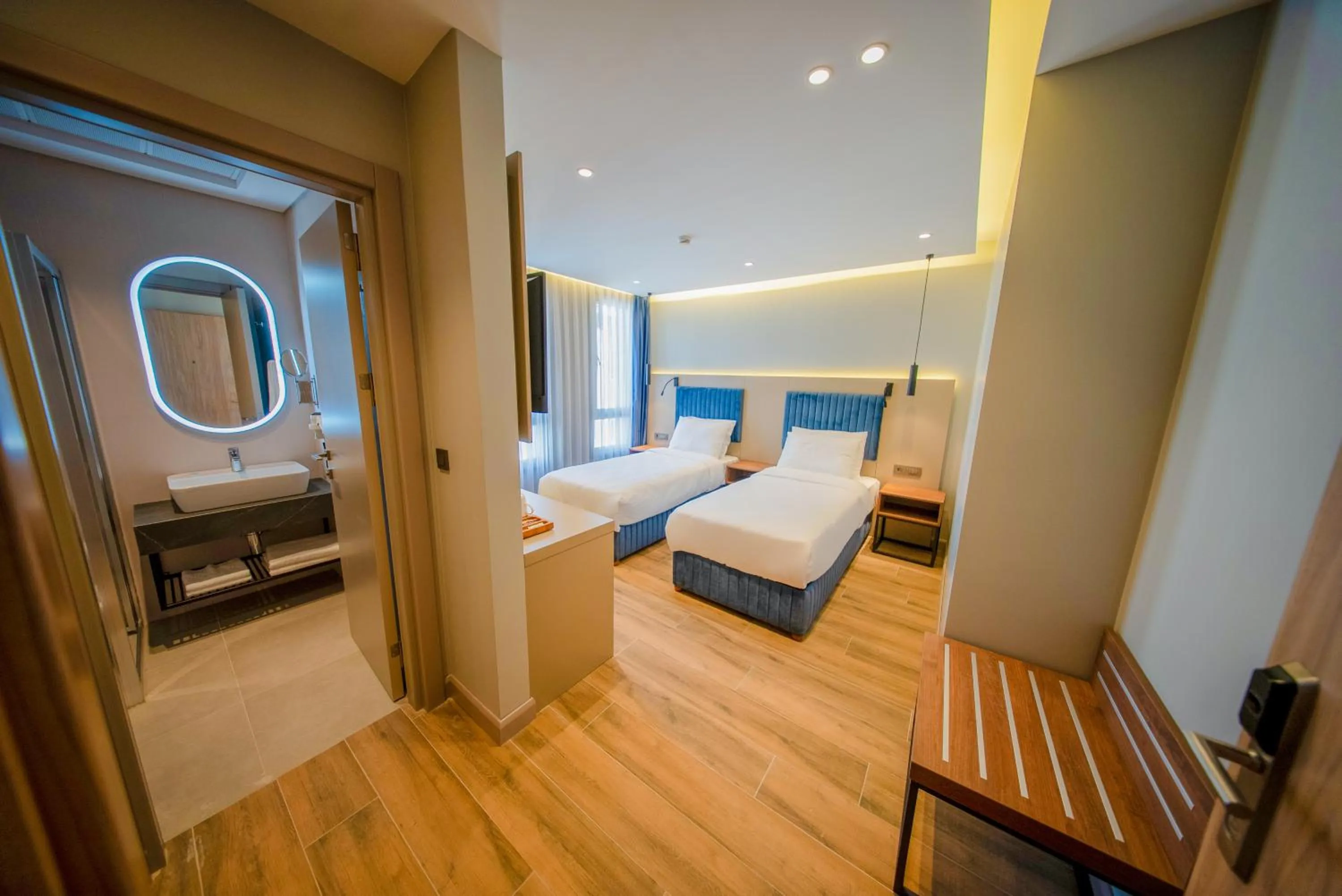 Bed in The Palm Bosphorus Hotel