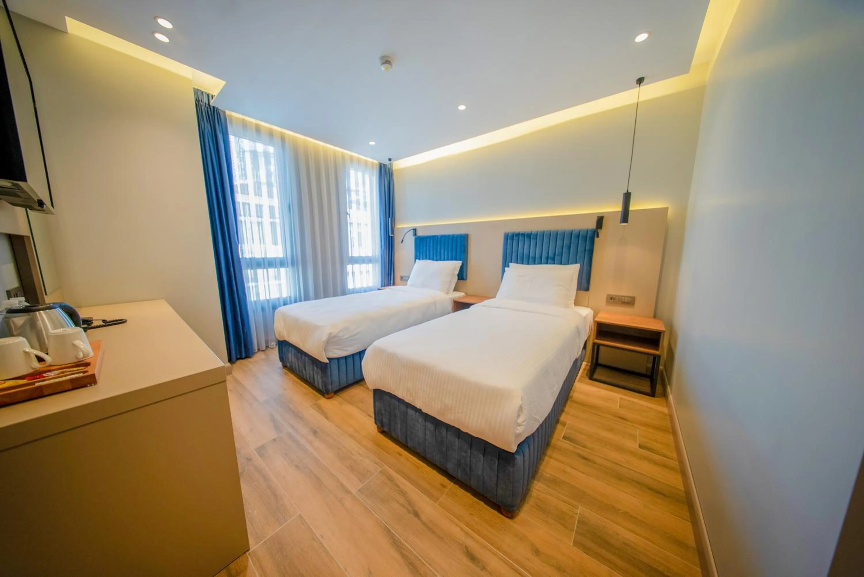 Bed in The Palm Bosphorus Hotel