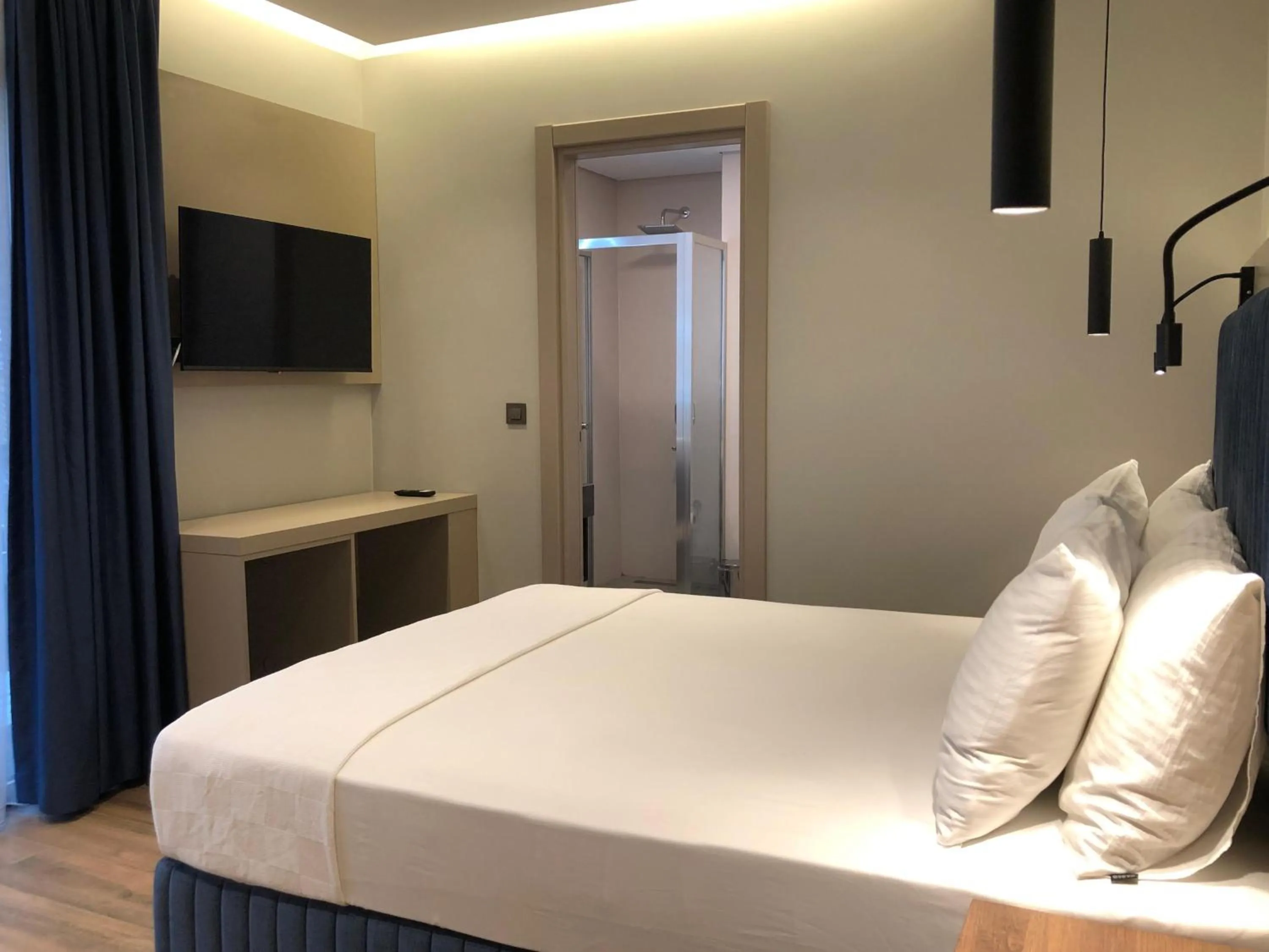 Bed in The Palm Bosphorus Hotel