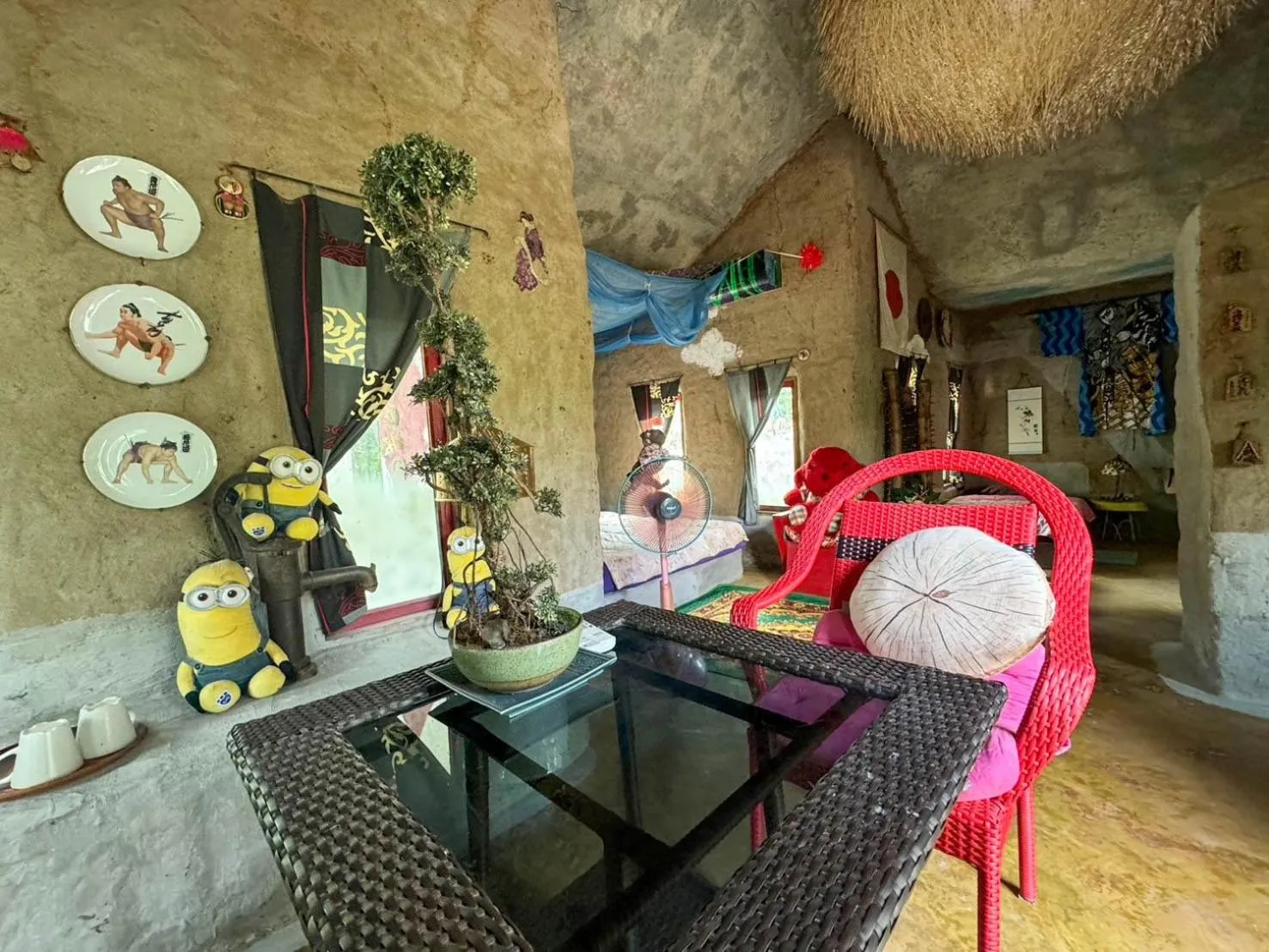 Seating area in Clay House Chiang Mai By Alphatel