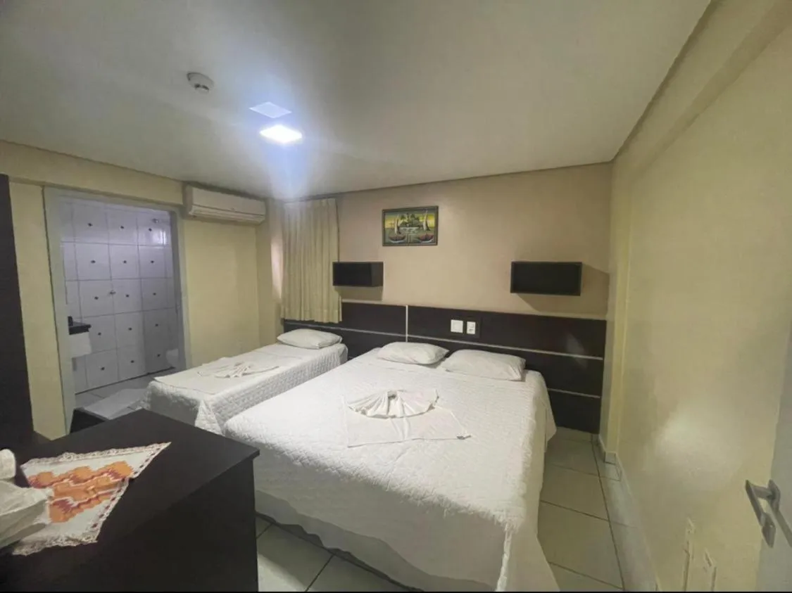 Bed in Hotel Tropical