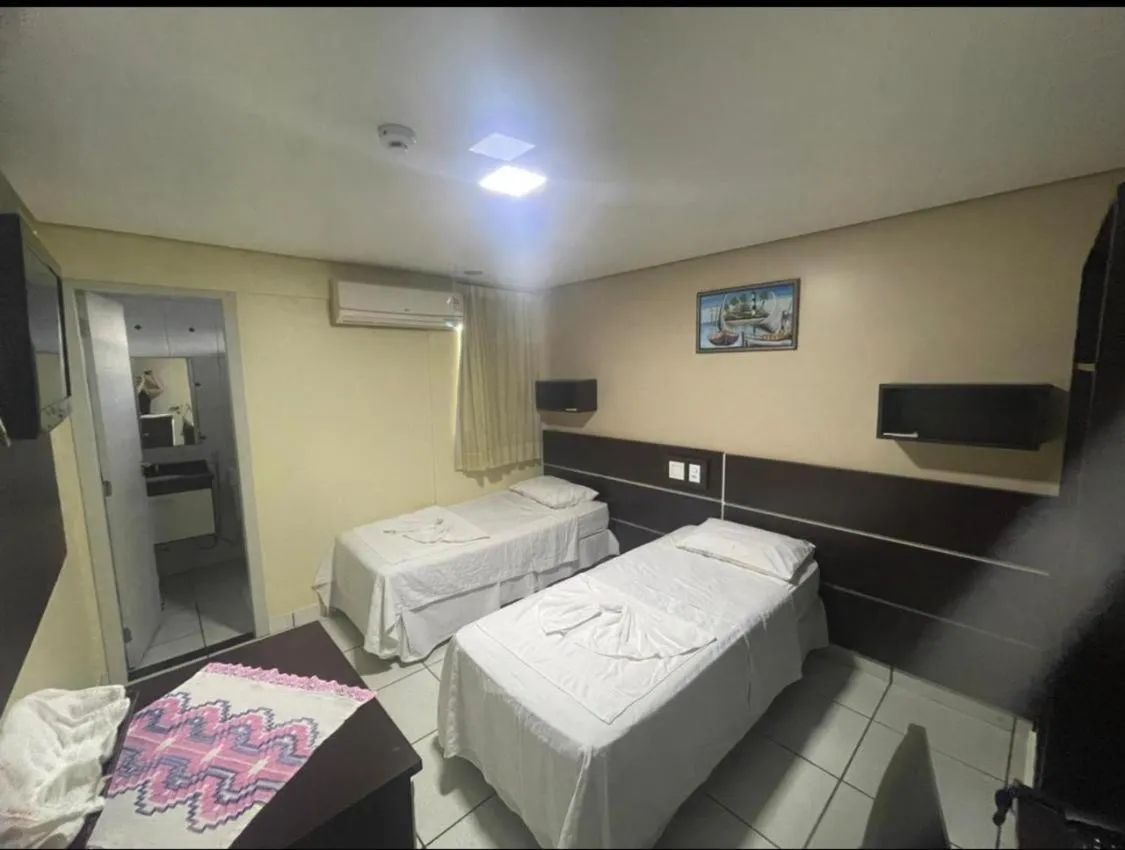 Bed in Hotel Tropical