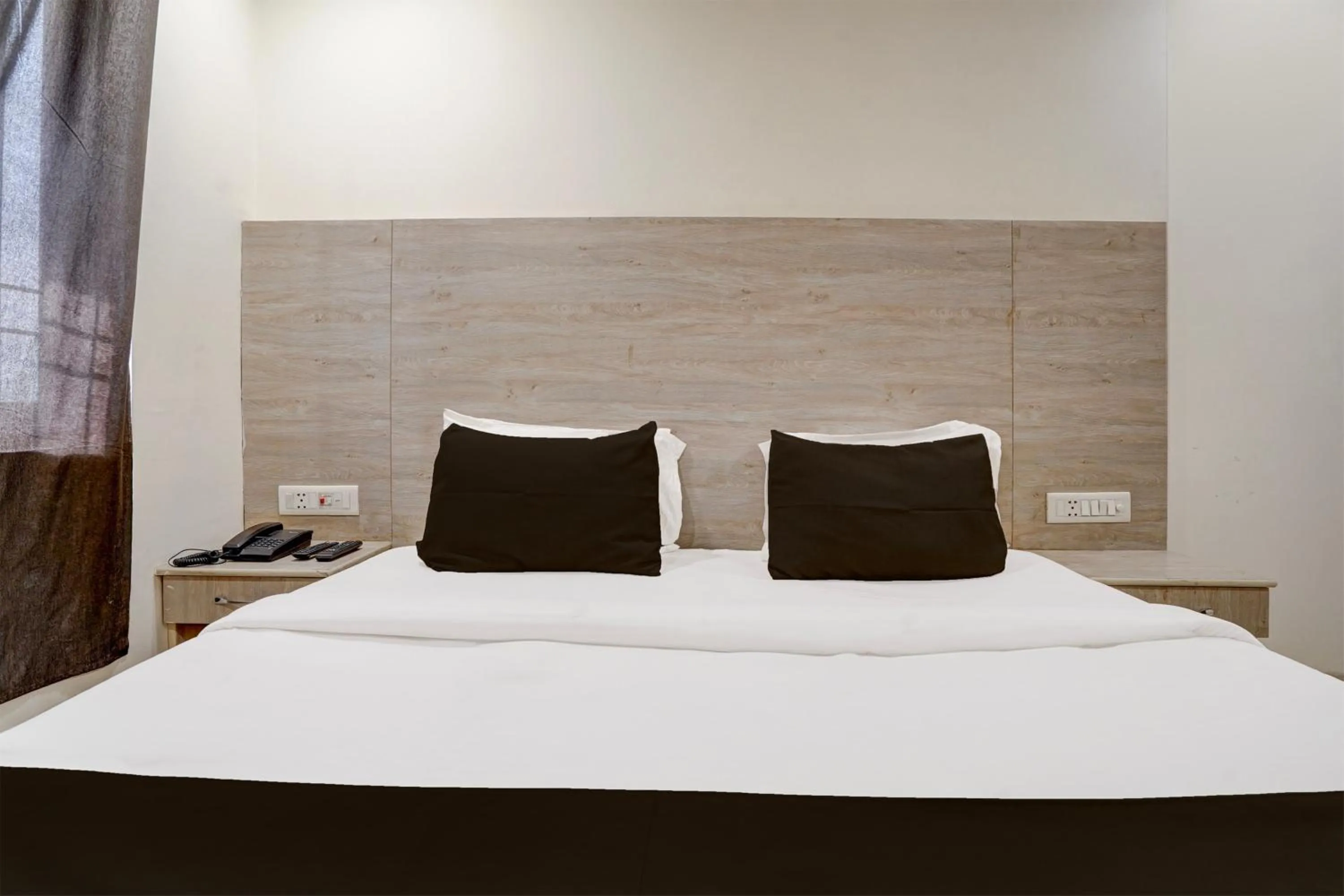 Bedroom in Hotel O Delhi Airport Stay