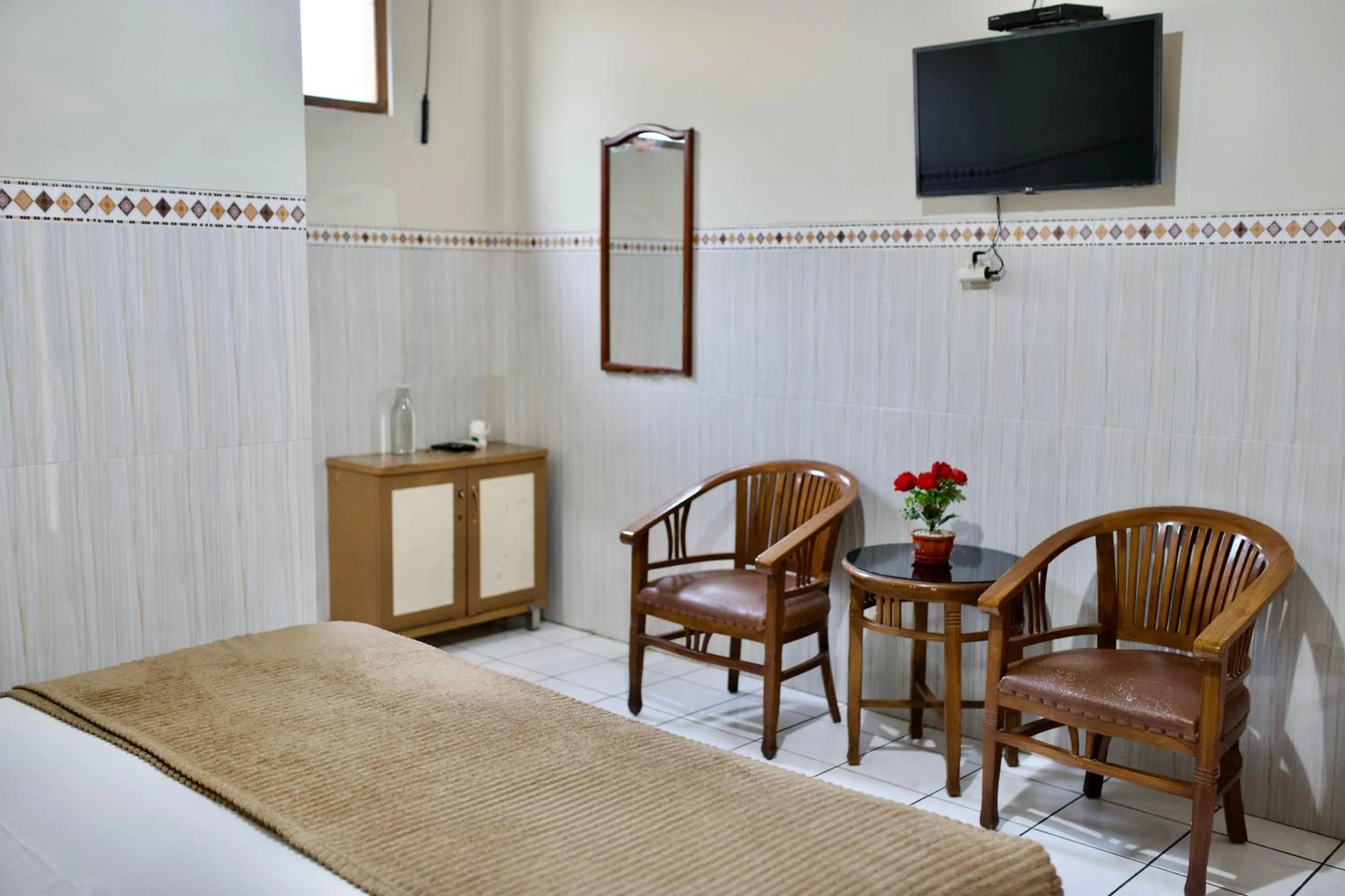 Bed in Garuda Setia Hotel