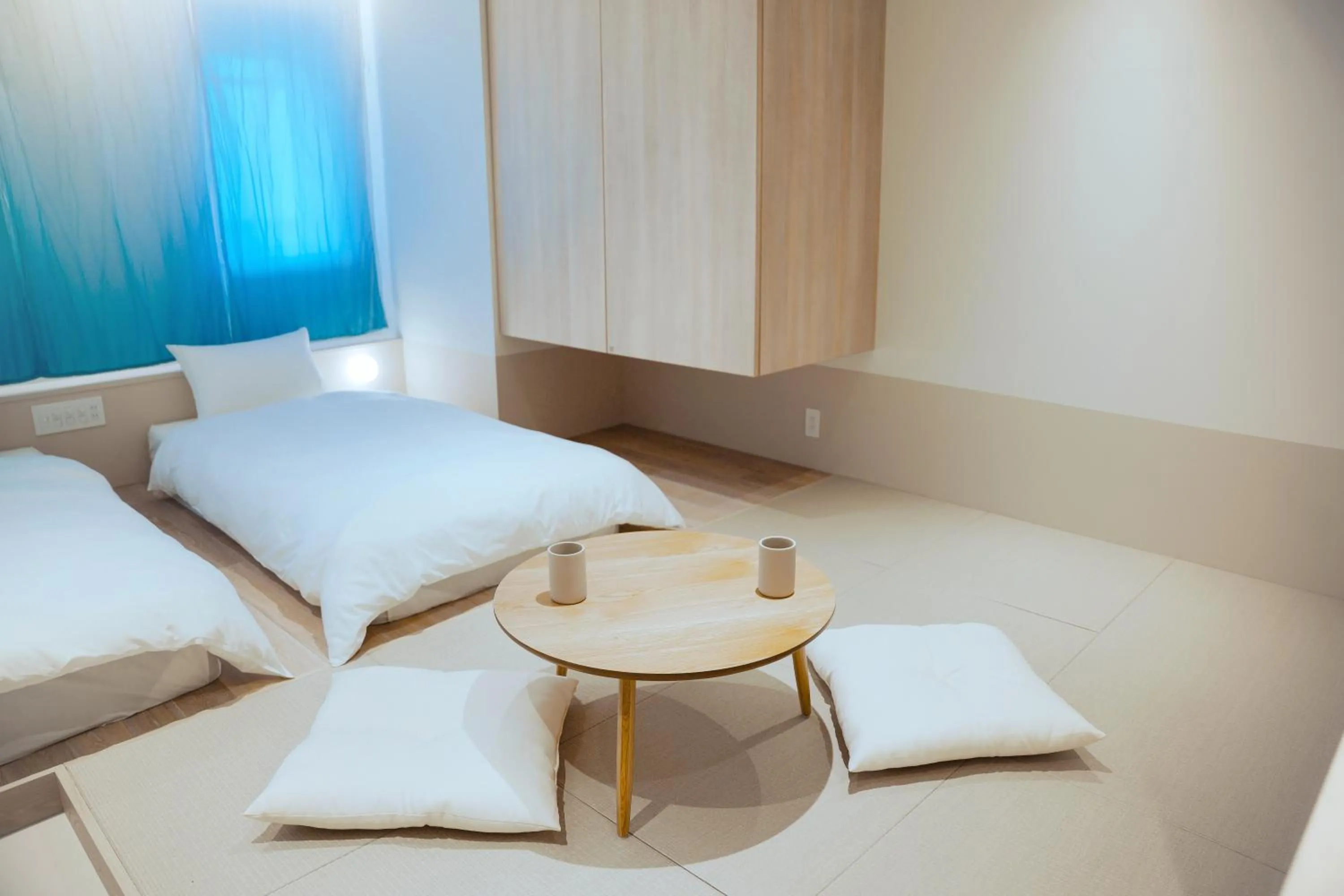 Photo of the whole room, Bed in SEKAI HOTEL Takaoka