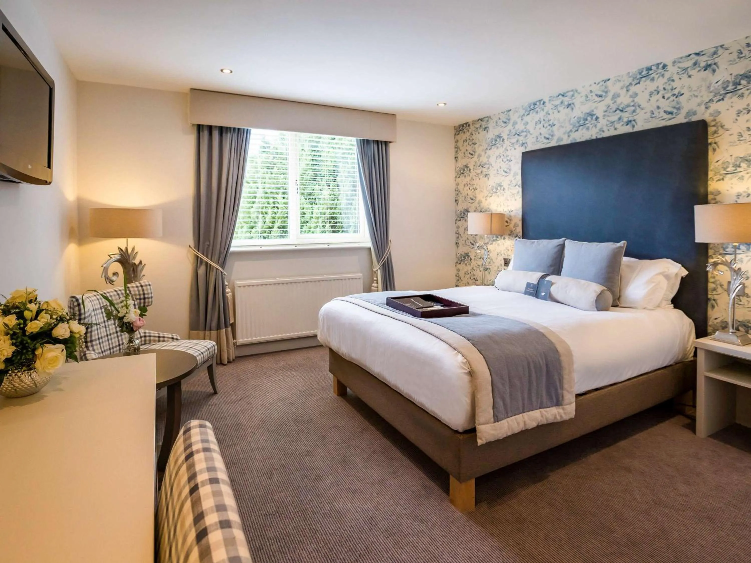 Photo of the whole room, Bed in WorldHotels Distinctive Woughton House Hotel