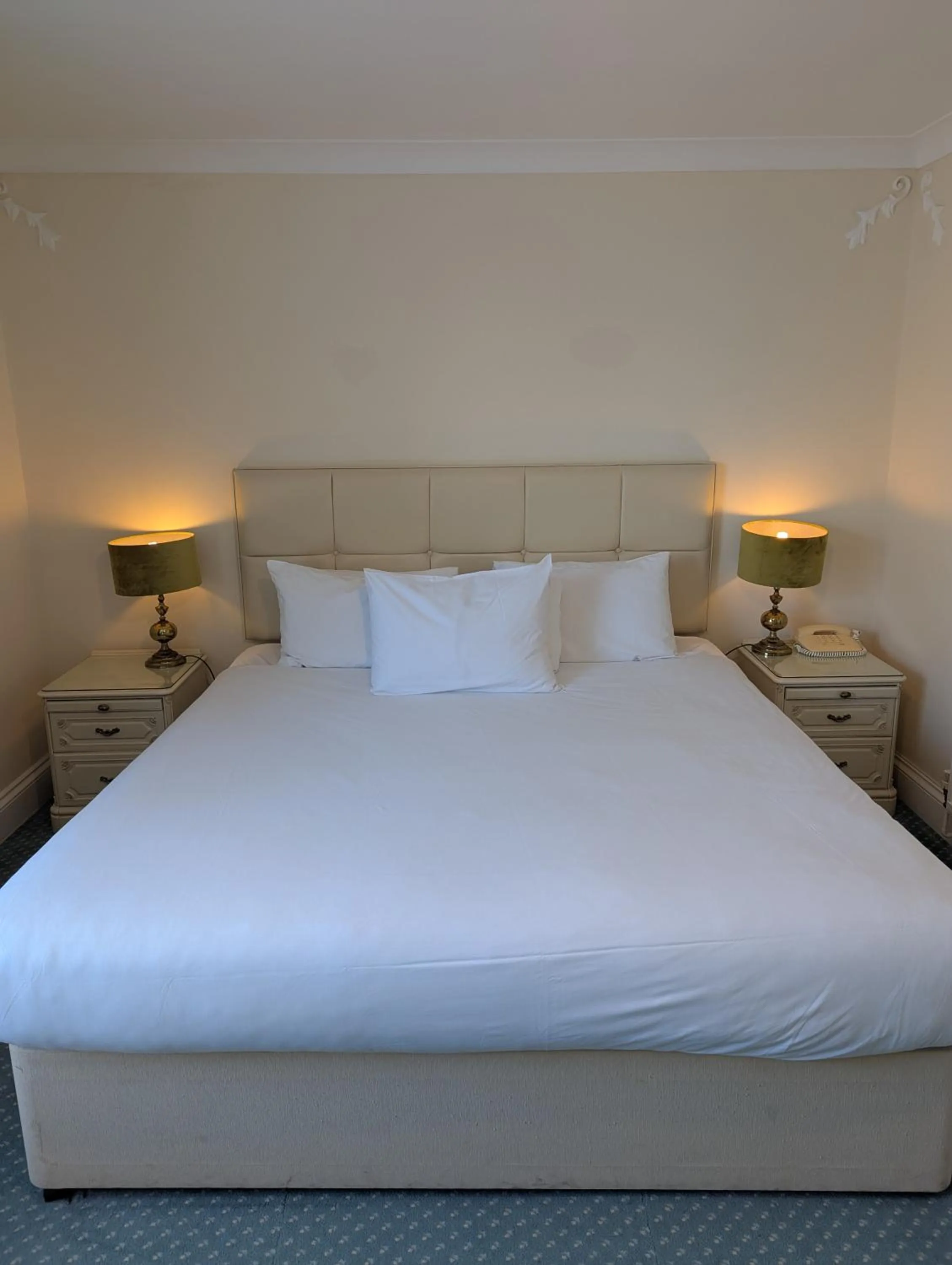 Bed in The Walnut Tree Hotel